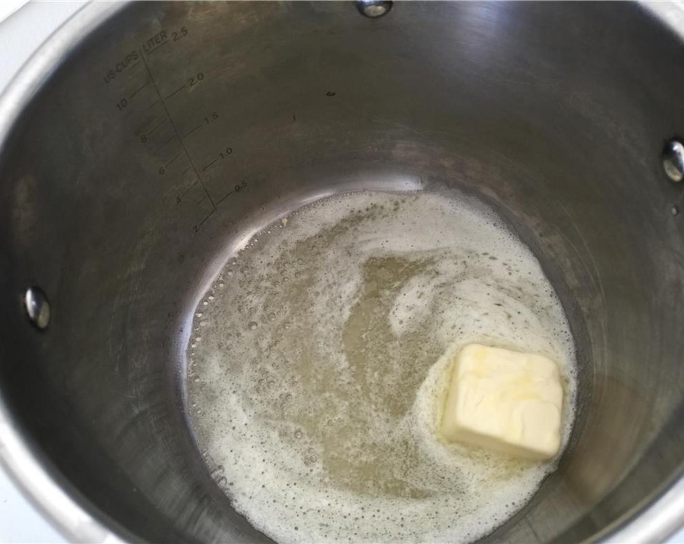 step 1 Melt the Unsalted Butter (3 Tbsp) in a large pot over medium heat.