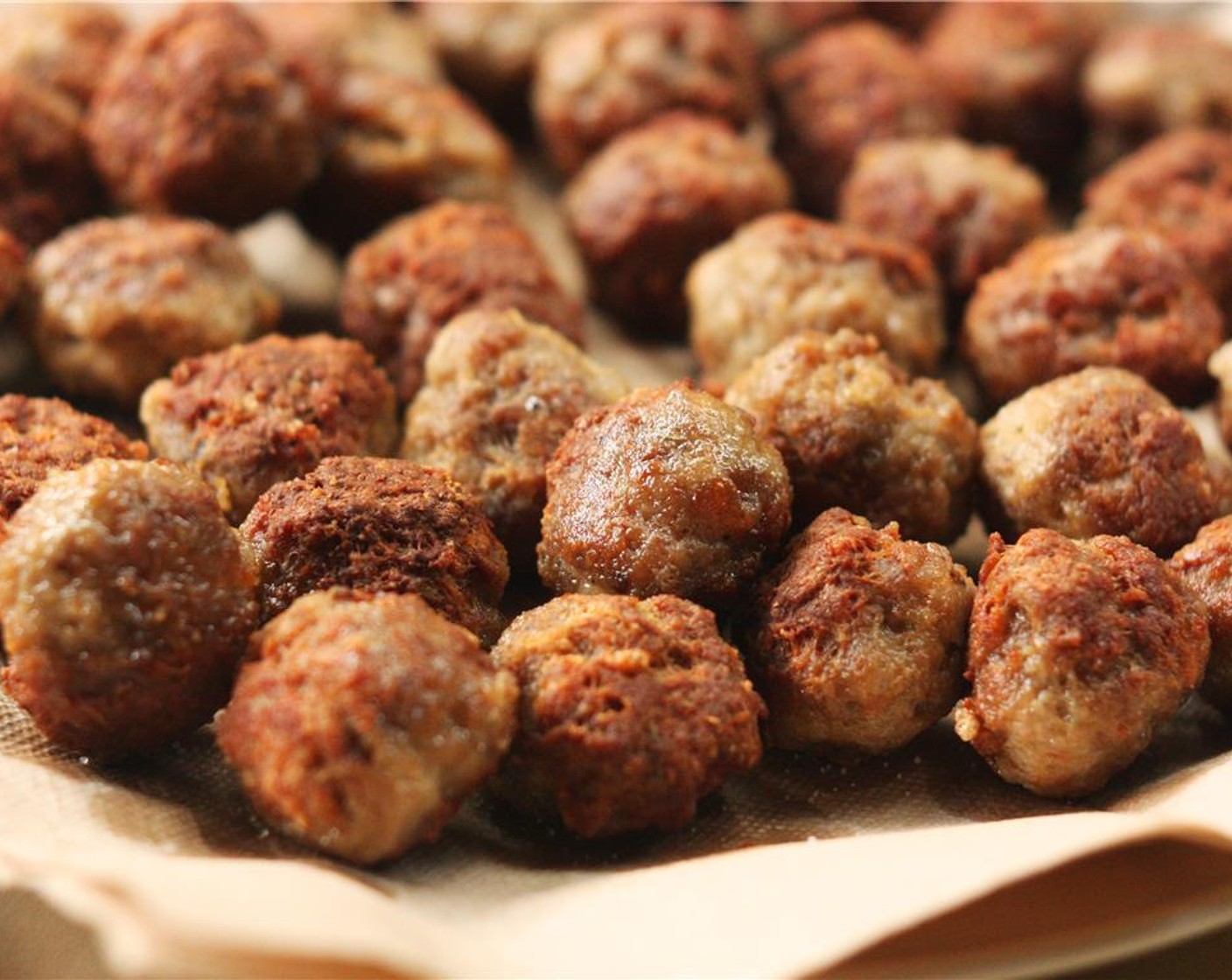 step 5 Remove meatballs to a plate lined with paper towels to soak up any excess grease.