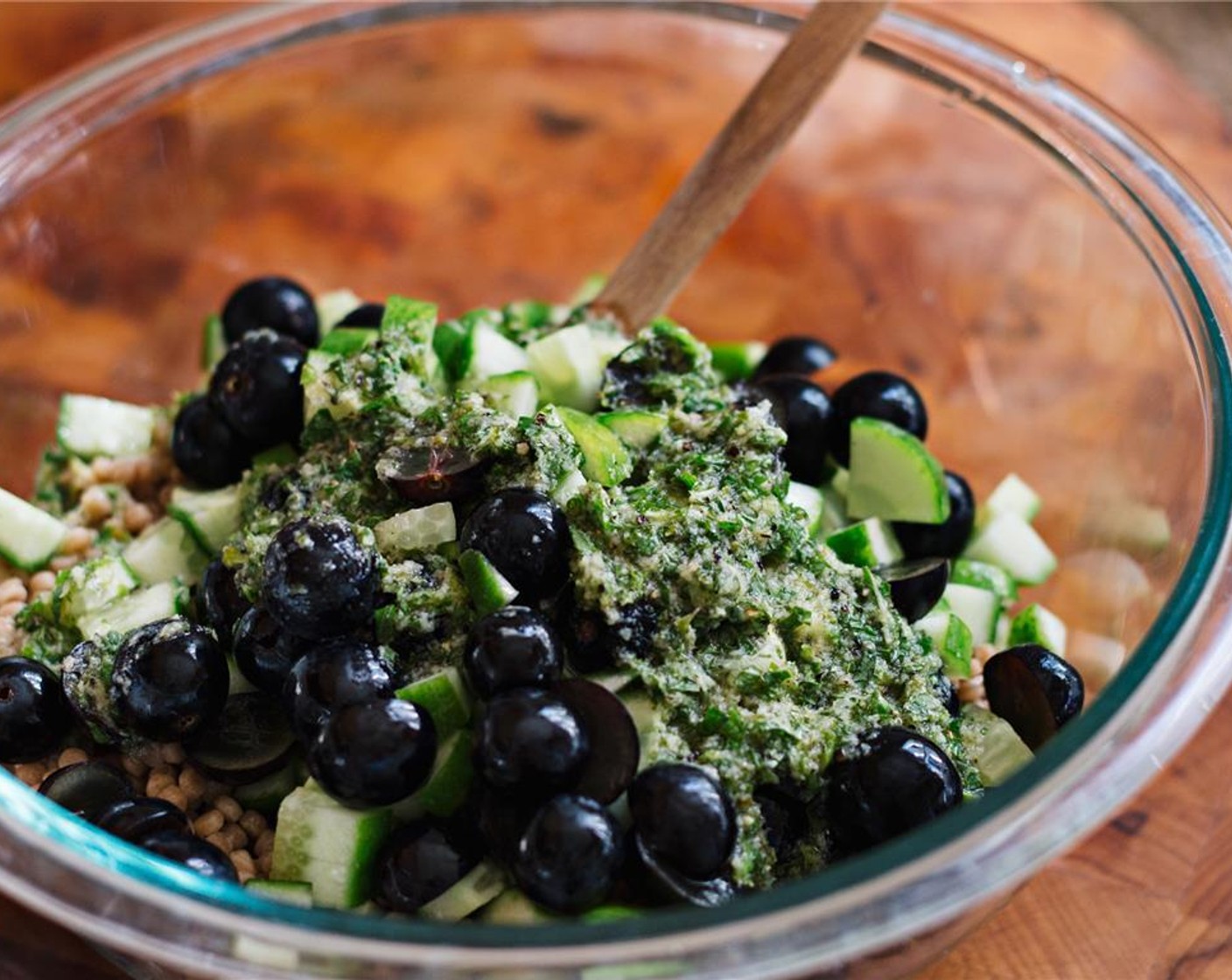 step 4 Fluff the couscous with a fork and dump into a bowl. Mix with the cucumbers, Fresh Mint (4 Tbsp), grapes, and dressing.