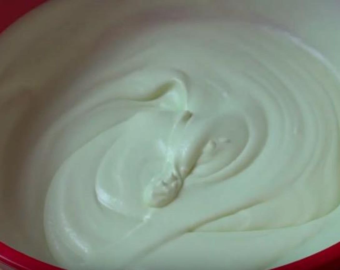 step 6 In a large mixing bowl, add marshmallow mixture, Peppermint Essence (1 tsp), Green Food Coloring (to taste) and a quarter of the whipped cream mixture. Mix together and then stir in the remaining cream.