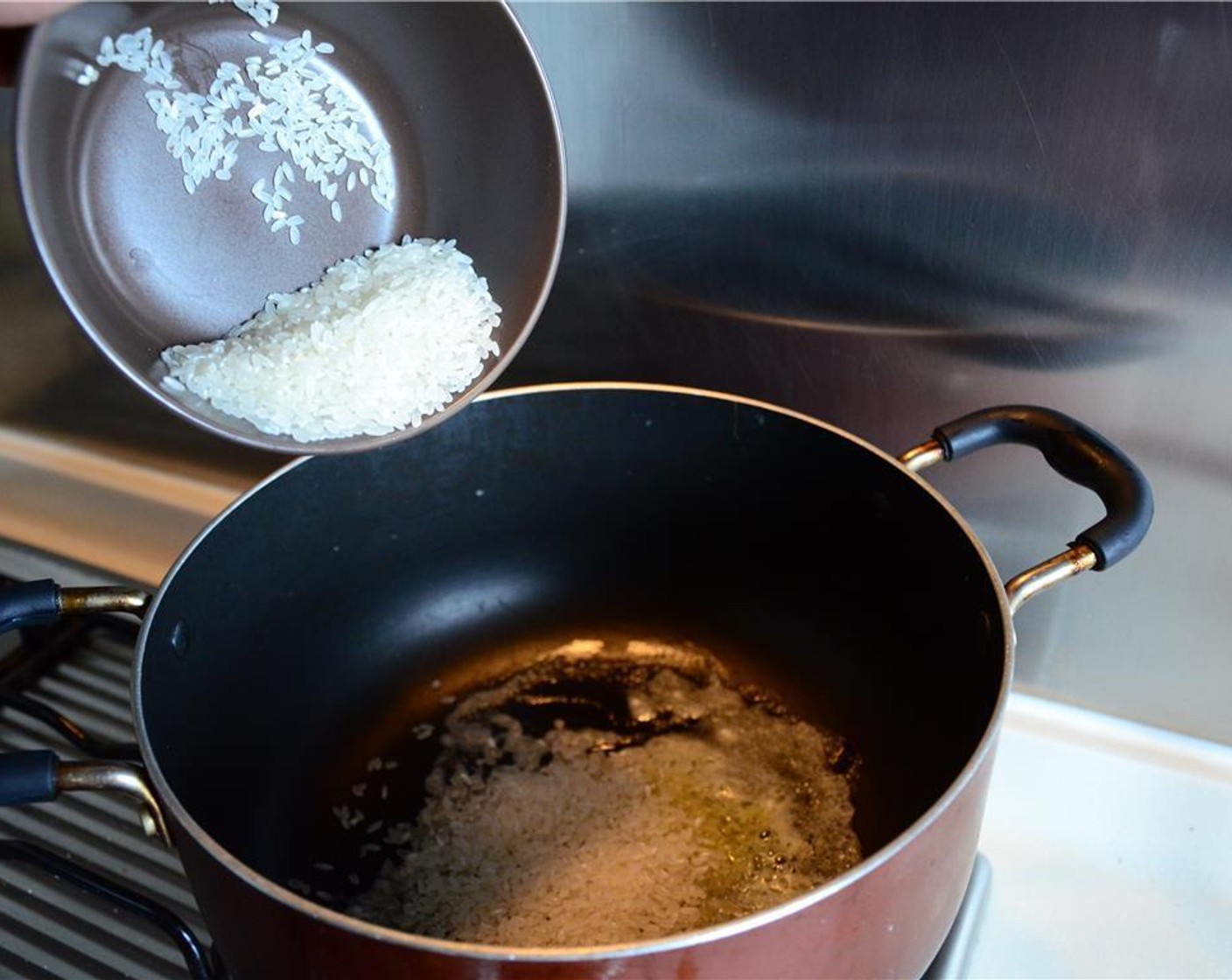 step 1 Melt the Unsalted Butter (1 Tbsp) in a large pot and sauté the Short Grain White Rice (1/2 cup) for a minute.