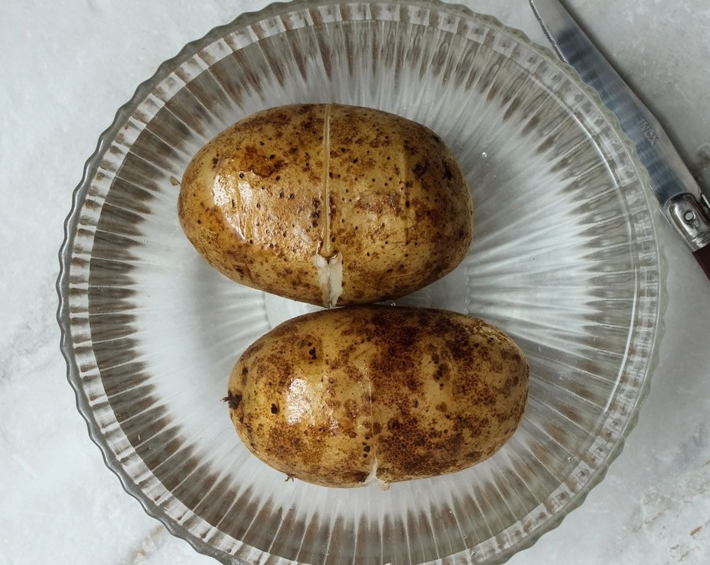 step 10 When the potatoes are done, drain the water out of the pot.