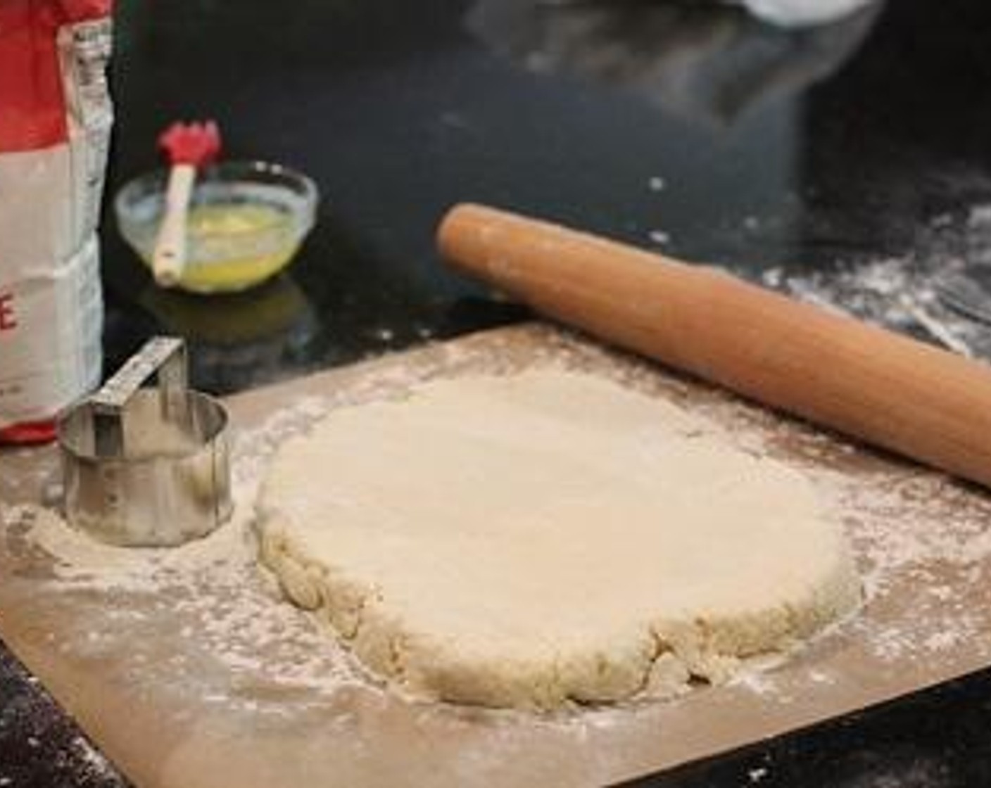 step 4 Turn out dough onto a lightly floured work surface, and pat into a 6 1/2-inch round (about 1 inch high). Using a lightly floured 2 1/2-inch cutter, cut out rounds.