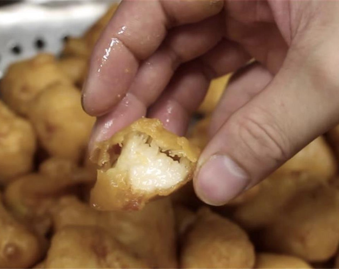 step 8 Fry all of the chicken again in the 375 degrees F (190 degrees C) oil for 3-4 minutes until golden brown. Drain and set aside. The chicken should be moist inside and the breading should keep its structure.