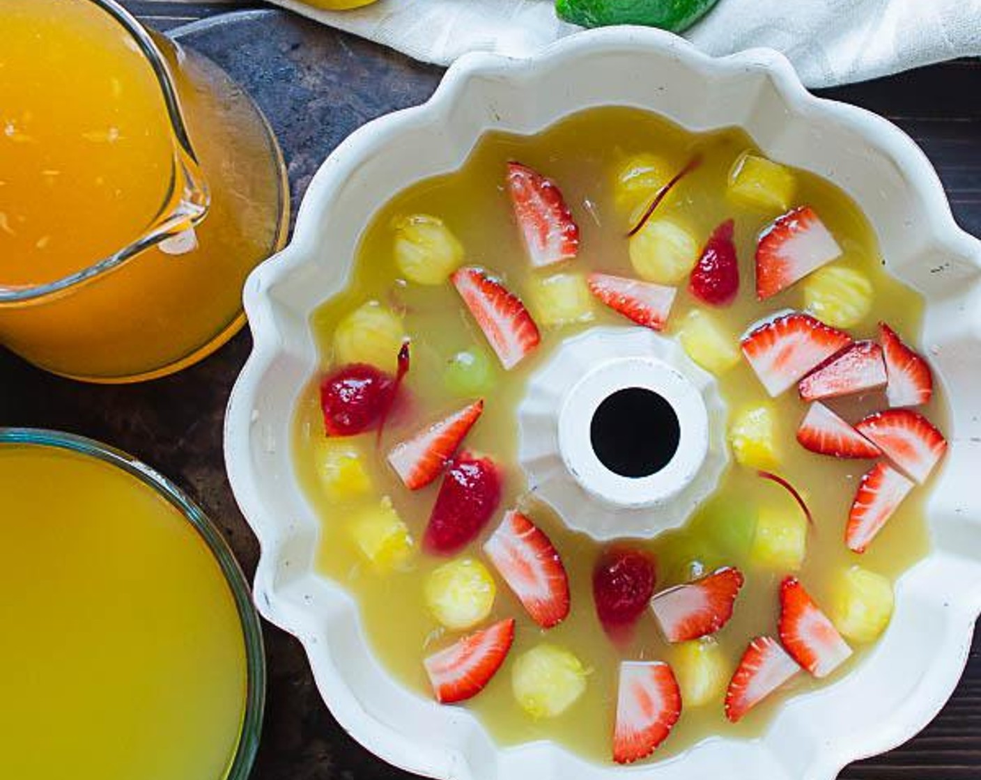 step 5 To serve, pour the tea mixture, pineapple juice, sparkling apple juice and club soda into the punch bowl.