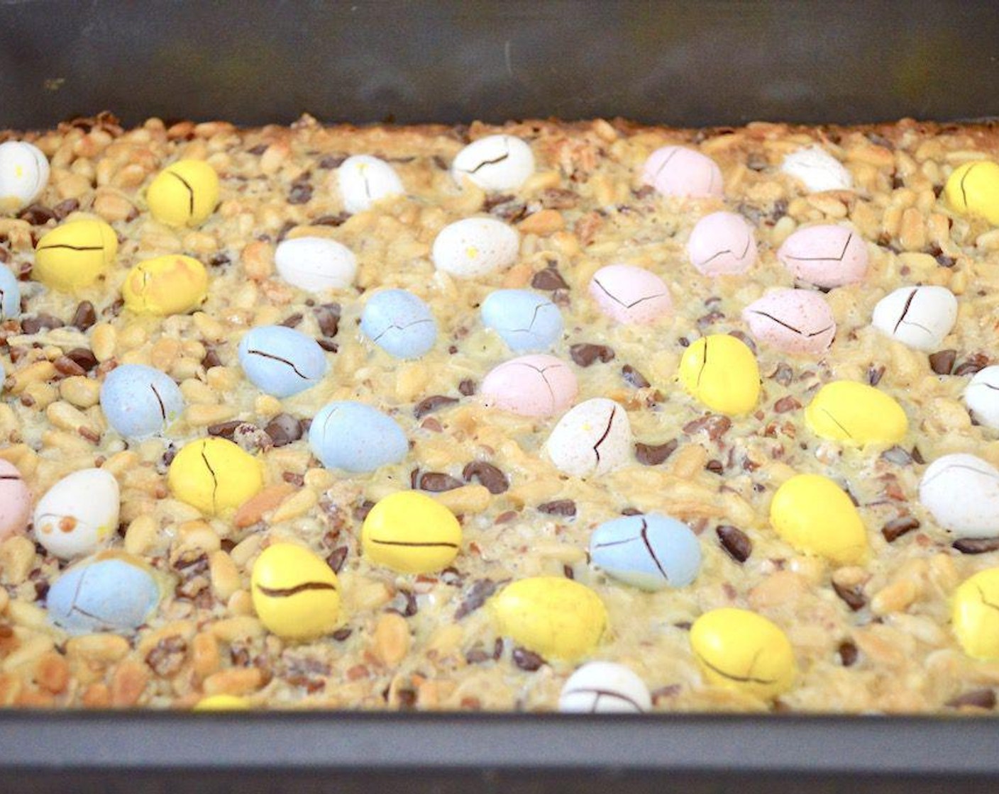 step 5 Bake the tray for 30 minutes. Let it cool for another 30 minutes, then cut into 24 even squares.