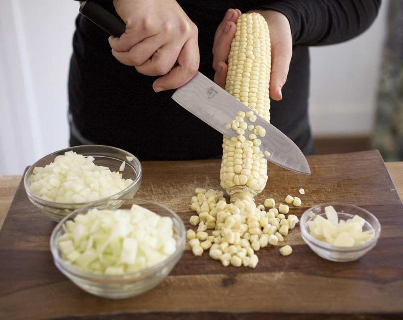 step 2 Zest and juice ONLY half of the Lemon (1) into a small bowl; discard seeds. Slice the kernels off the Corn Cob (1); add to fennel.