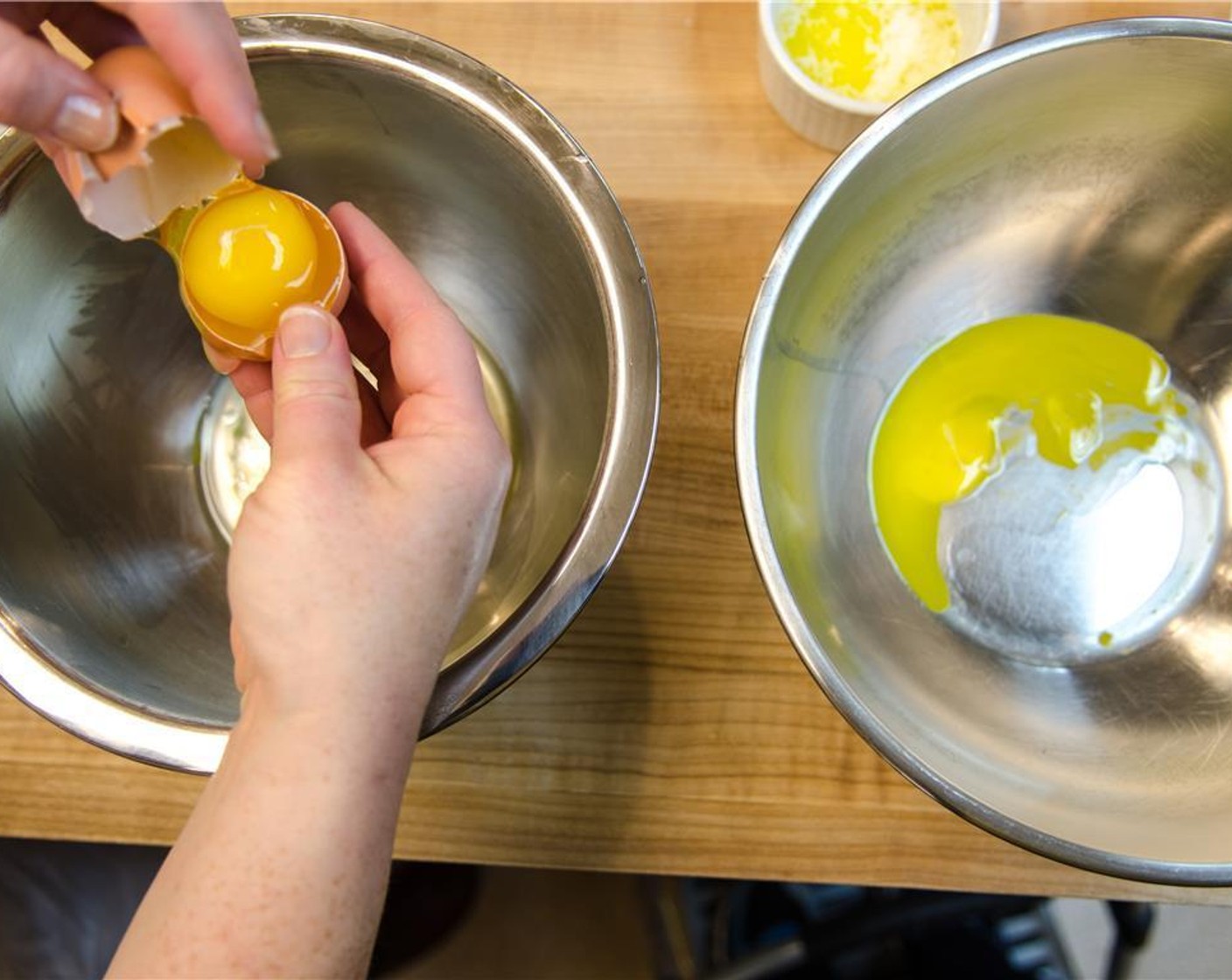 step 1 Melt the Unsalted Butter (2 Tbsp) and crack the Eggland's Best Classic Eggs (2) to separate the yolks and whites into two separate medium-size bowls.
