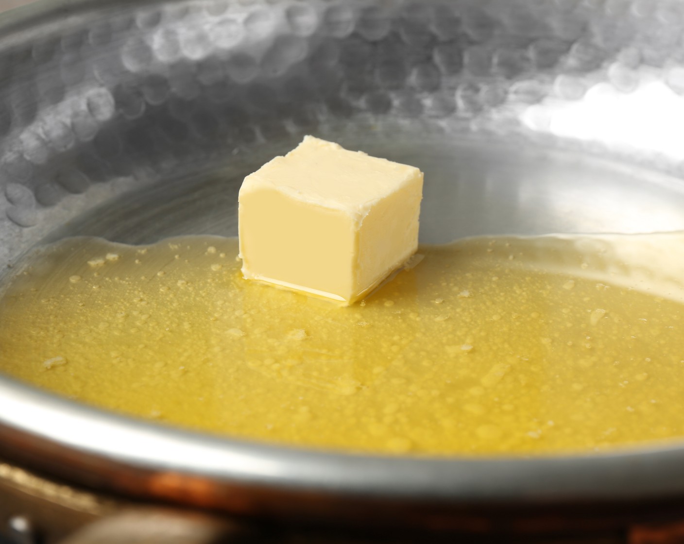 step 2 In a large saucepan melt Butter (3 Tbsp) over low heat. Add in orange juice, zest, and Vanilla Extract (1/2 tsp).