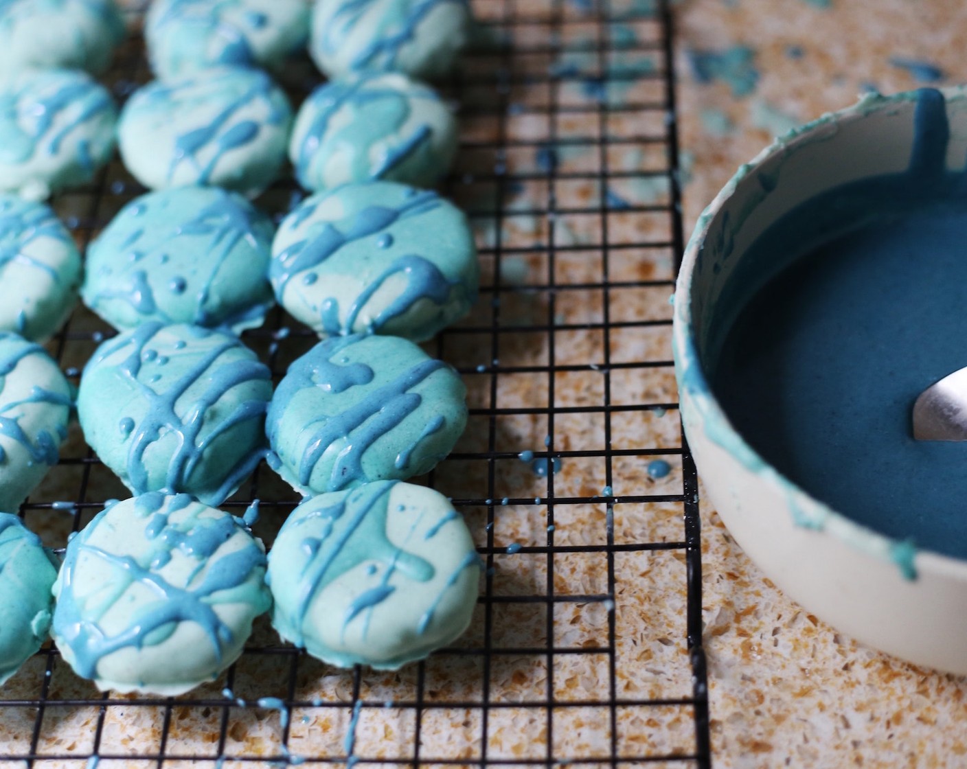 step 11 Using a fork, quickly splash patties with the darker chocolate.