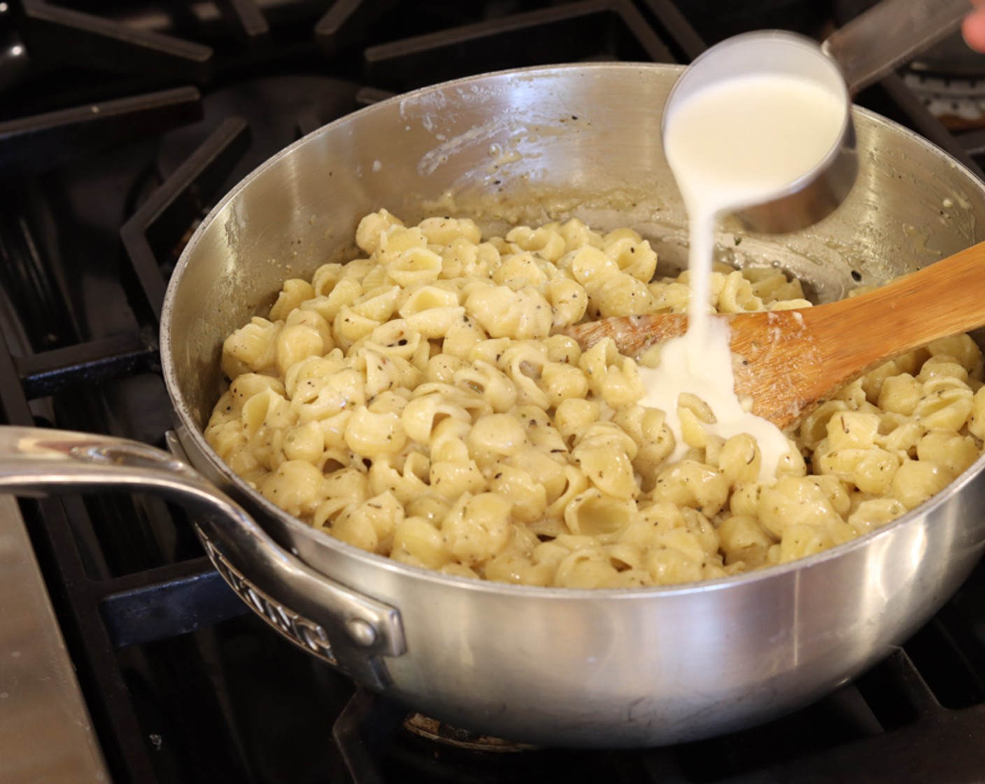 step 7 Return sauce to low heat and stir in the Heavy Cream (1/4 cup) and fold in the Bacon (5 pieces).