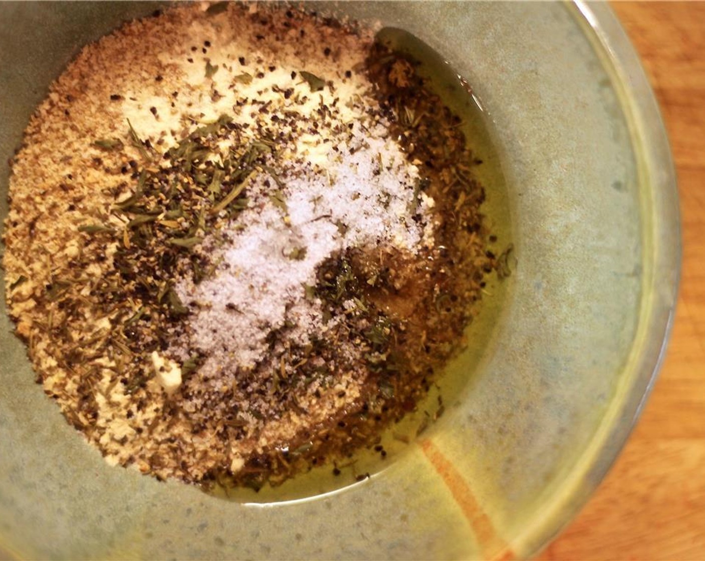 step 11 Mix the Breadcrumbs (1/2 cup), remaining fresh thyme, Salt (to taste), Ground Black Pepper (to taste), and Olive Oil (1 tsp). Sprinkle this on top of the pot, and place in the oven to brown, about 10 minutes.