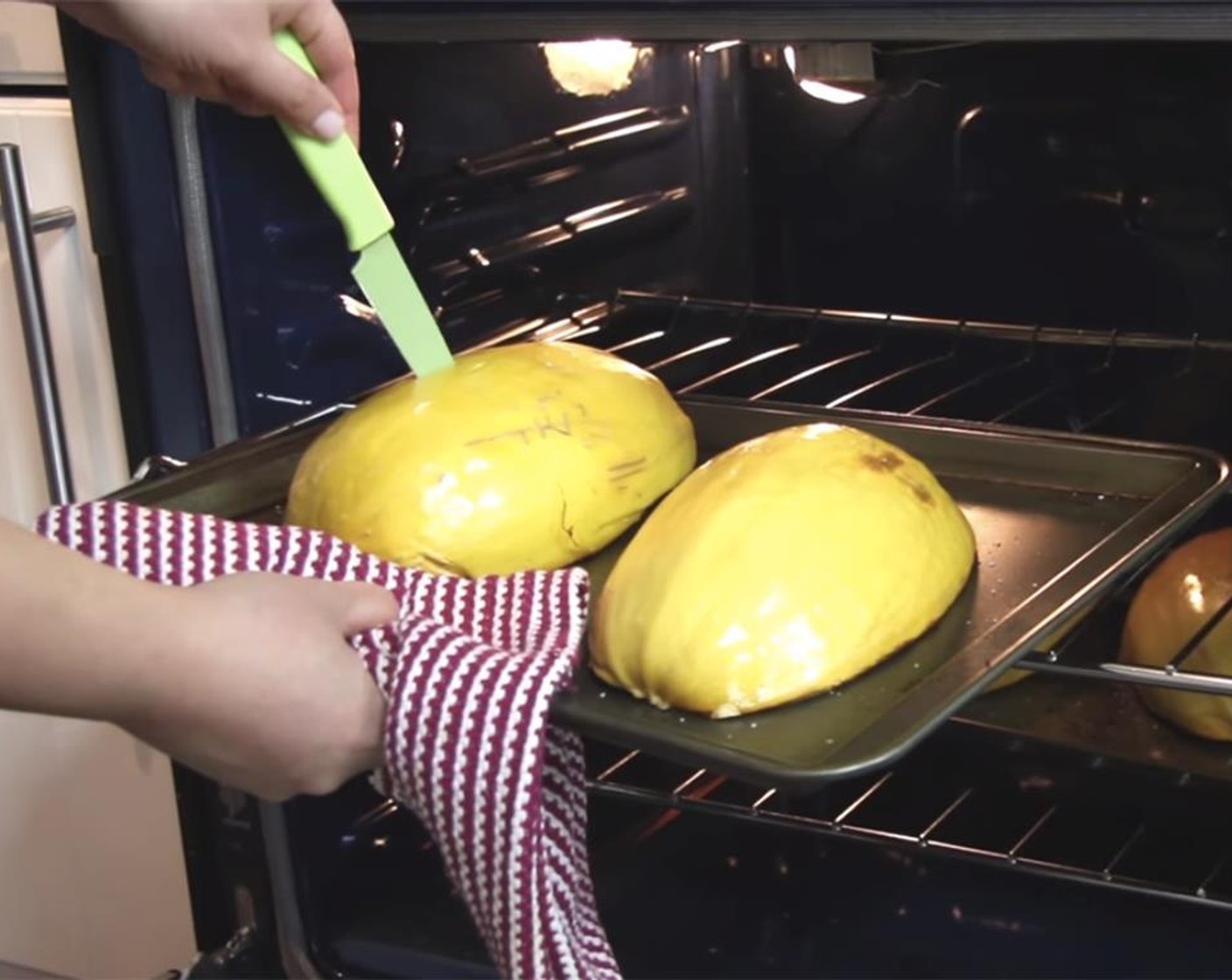 step 14 Take the squash out of the oven and pierce a knife through the thickest part of the squash to check for doneness.