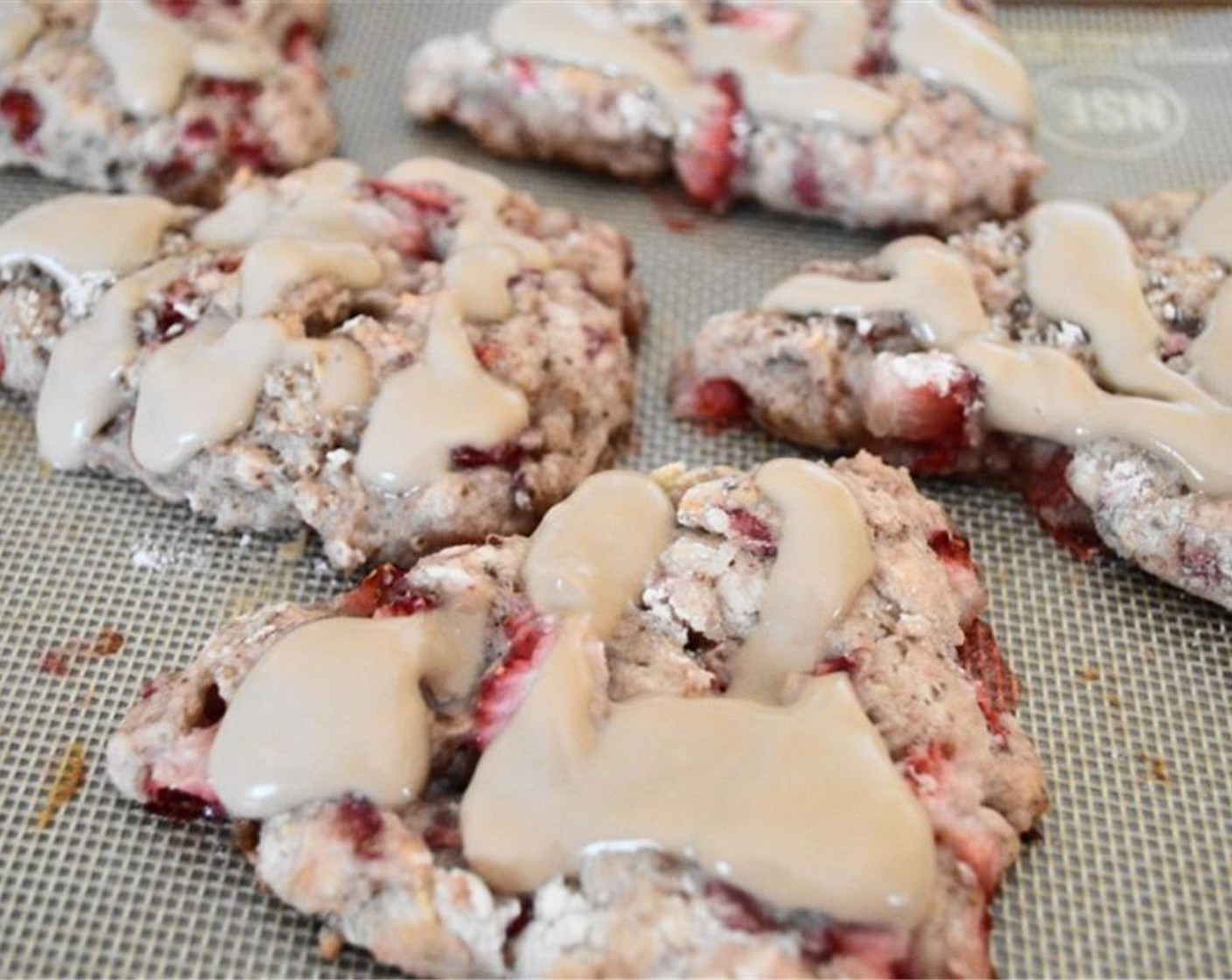 step 8 When the scones are done, let them cool for a few minutes. While they cool, drizzle the mascarpone mixture generously on top.