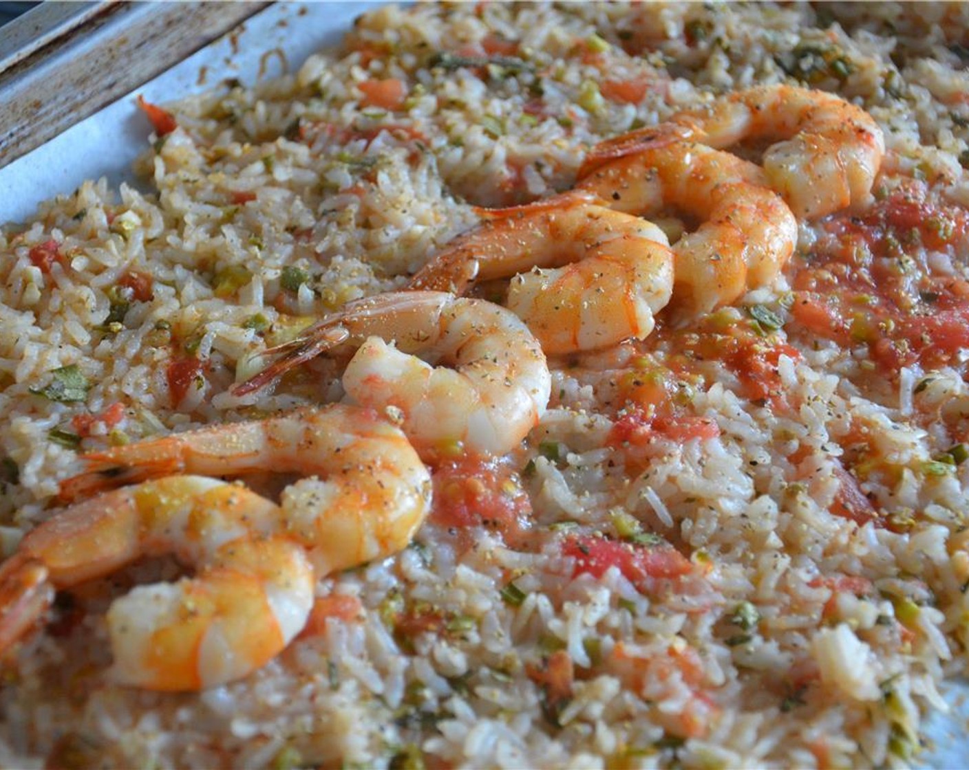 step 4 Place the Shrimp on a greased pan and season with Salt (to taste) and Ground Black Pepper (to taste). Place the pan in the oven and cooked for 35 minutes.