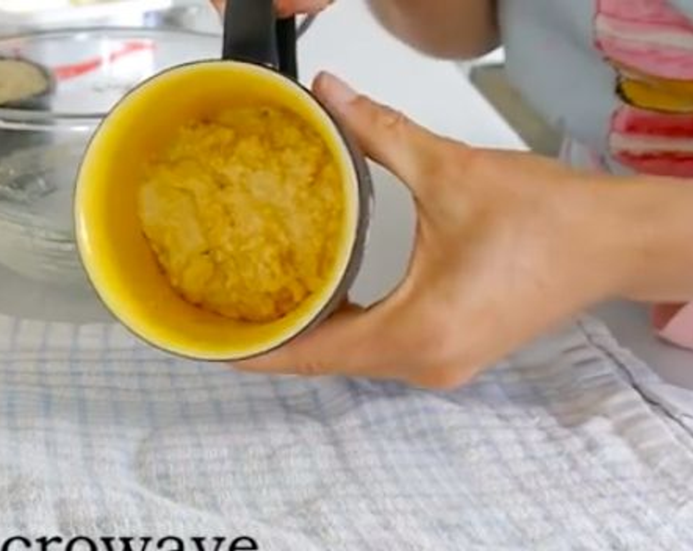 step 2 Once mixed, butter a cup and fill it with the almond mix. Cook in the microwave for 1 minute at fill power