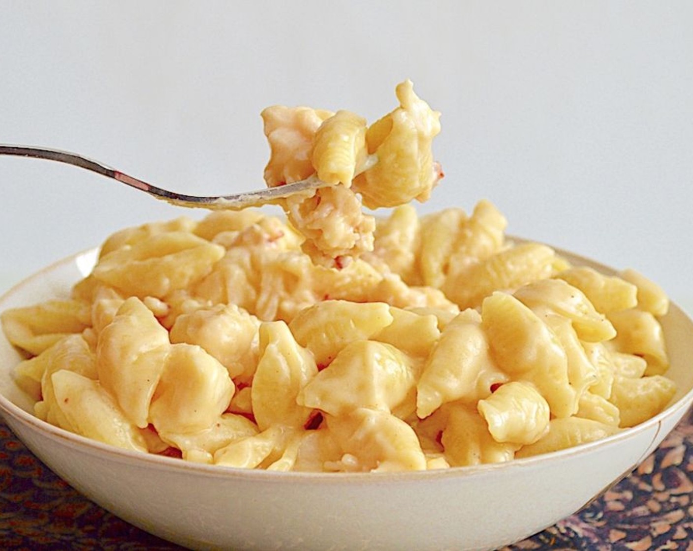 step 9 Take the pan off of the heat and serve the mac and cheese immediately!