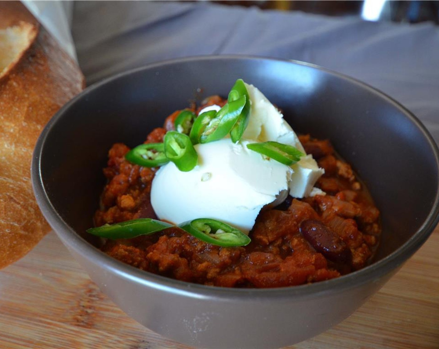 step 10 Serve over rice and top with sour cream, or let the chili cool and refrigerate or freeze it.