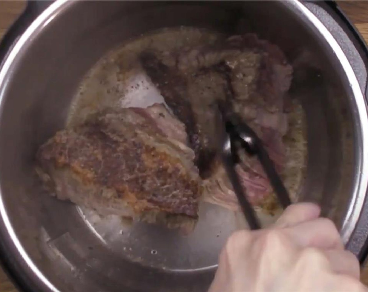 step 4 Sear the other side for another 5 minutes. Then, place the beef brisket on a chopping board and let the meat rest.