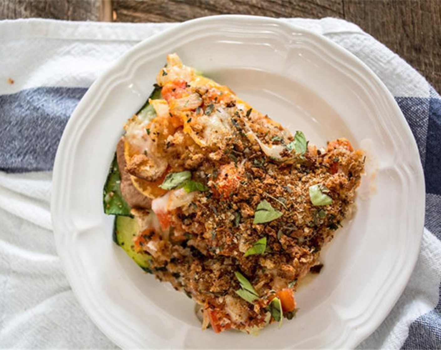 step 13 Top with bread crumbs and bake for 15 minutes. Top with Fresh Basil (to taste) and serve hot.