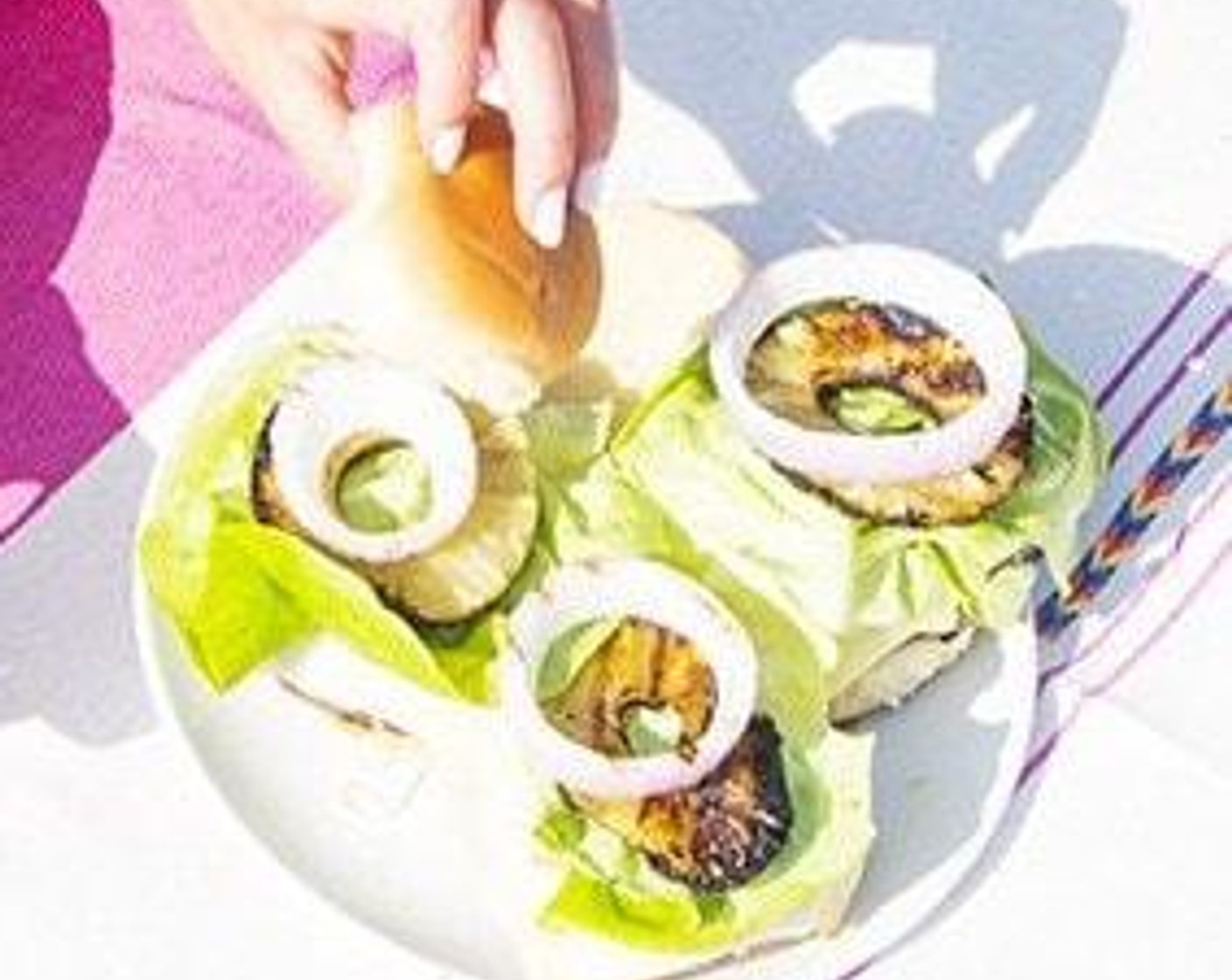step 5 Assemble sliders with grilled turkey patties, toasted buns, Mayonnaise (1/4 cup), Monterey Jack Cheese (8 slices), Butter Lettuce (8), pineapple ring, and onion rings.