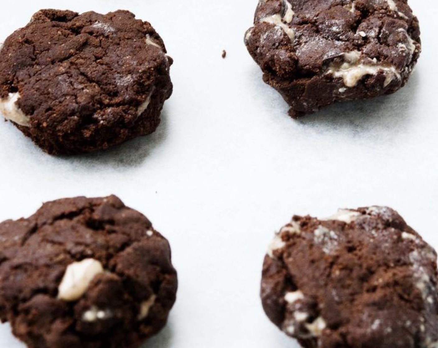 step 5 Scoop into balls and place a frozen blob of almond butter in the center of each ball.