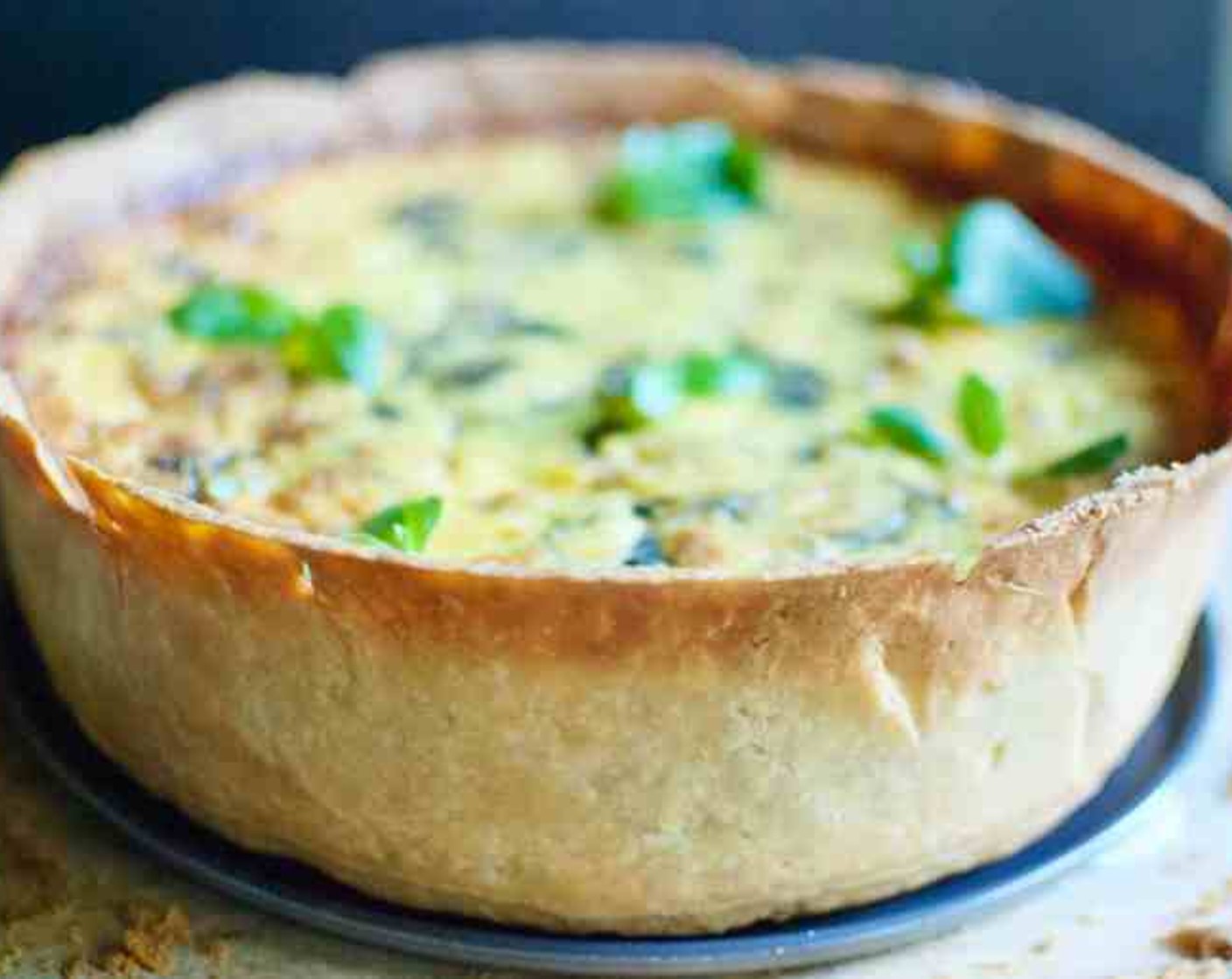 step 18 Let cool in the pan for 40 minutes. With an offset spatula or serrated knife, cut the pastry shell flush with the top of the pan. Carefully remove the springform pan ring.