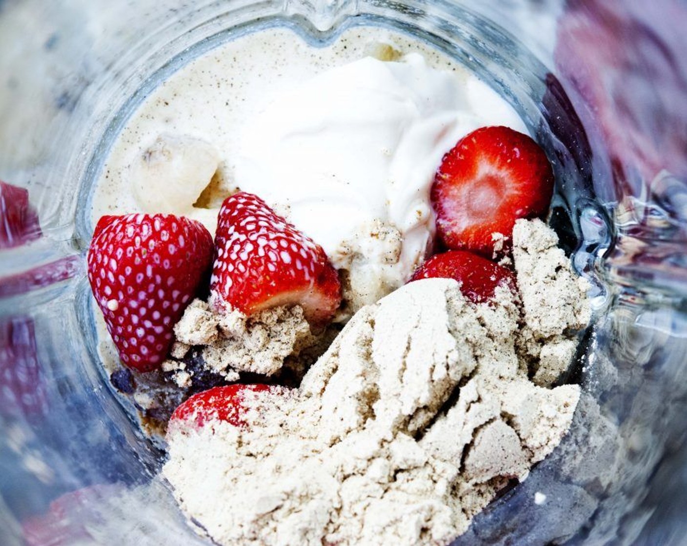 step 1 Collect the Fresh Strawberry (1 cup), Greek Yogurt (1/2 cup), Banana (1/2), Plant-Based Protein Powder (1 scoop), 1 whole Fig (1), and Vanilla Extract (1/2 tsp) and place them into a blender.