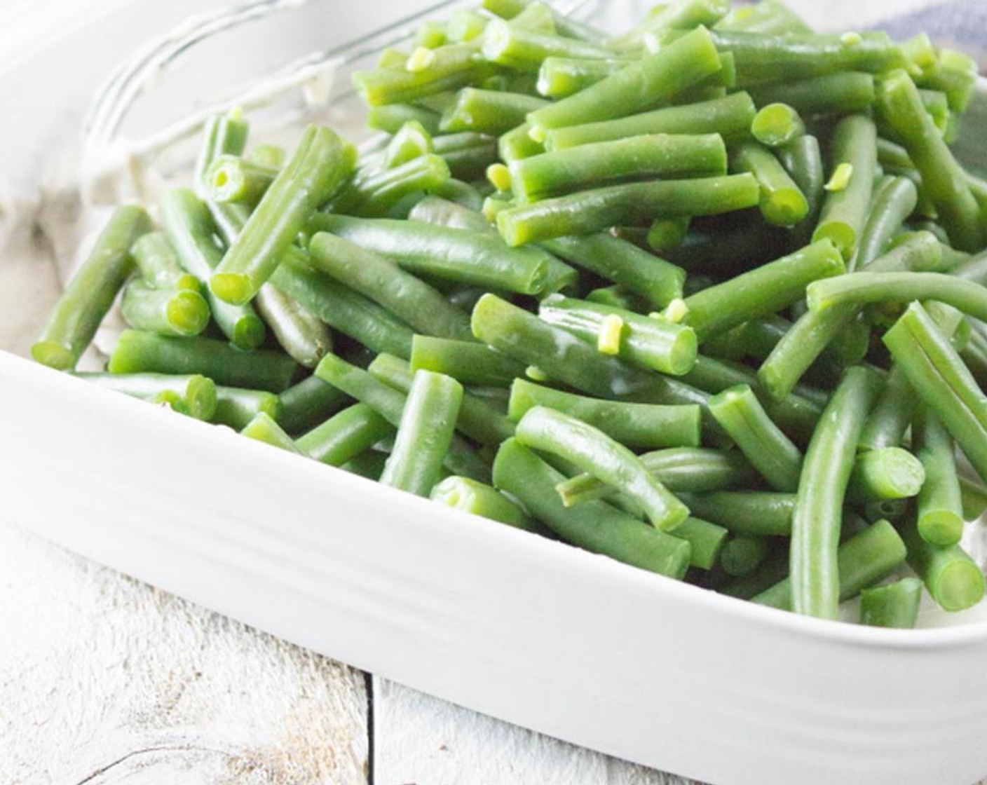 step 8 Strain green beans and add to mushroom mixture, mix until completely coated.