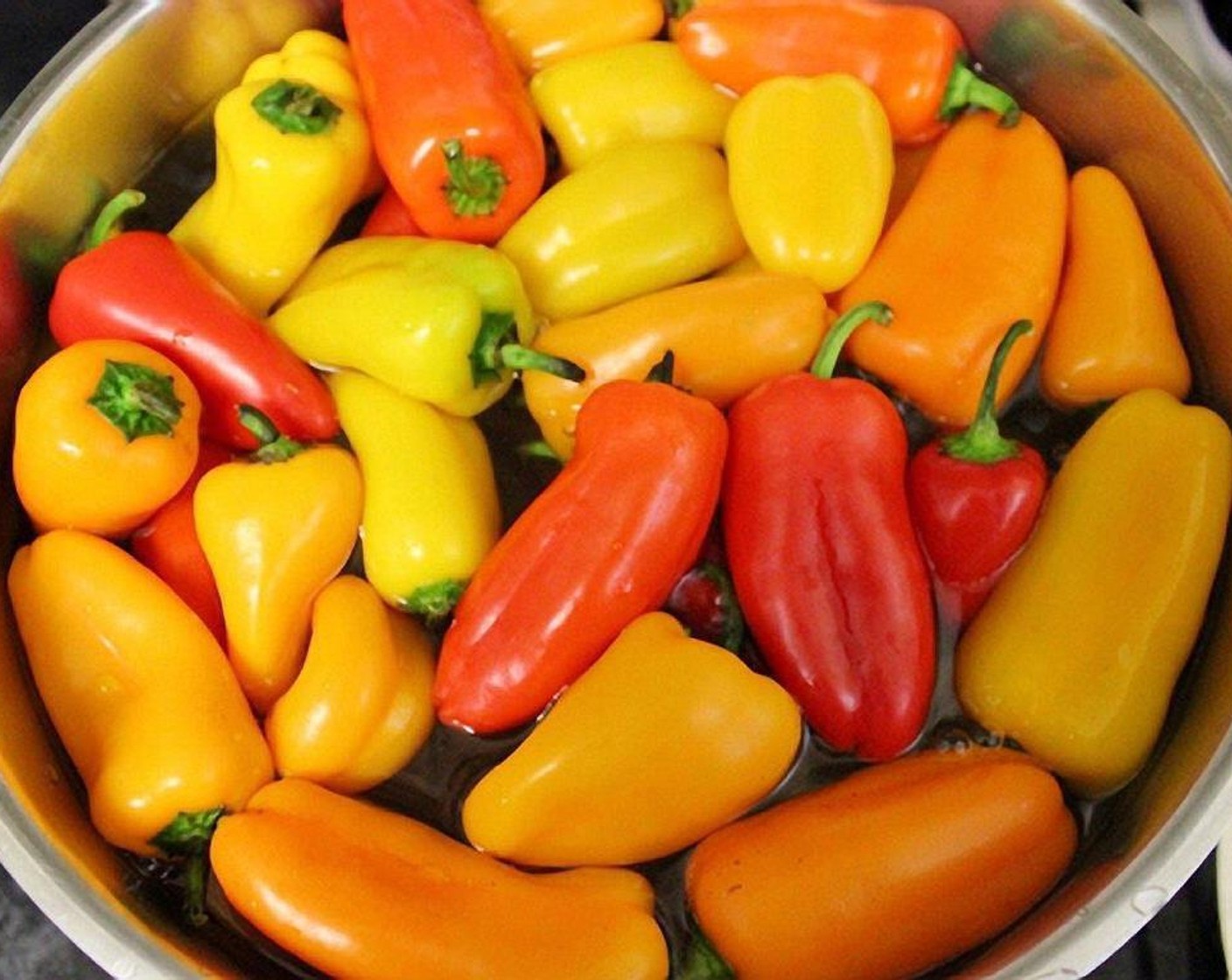 step 2 Bring a large pot of water to a boil. Add the Mini Peppers and blanch for about 3 minutes. Using a slotted spoon, take the peppers out of the boiling water.