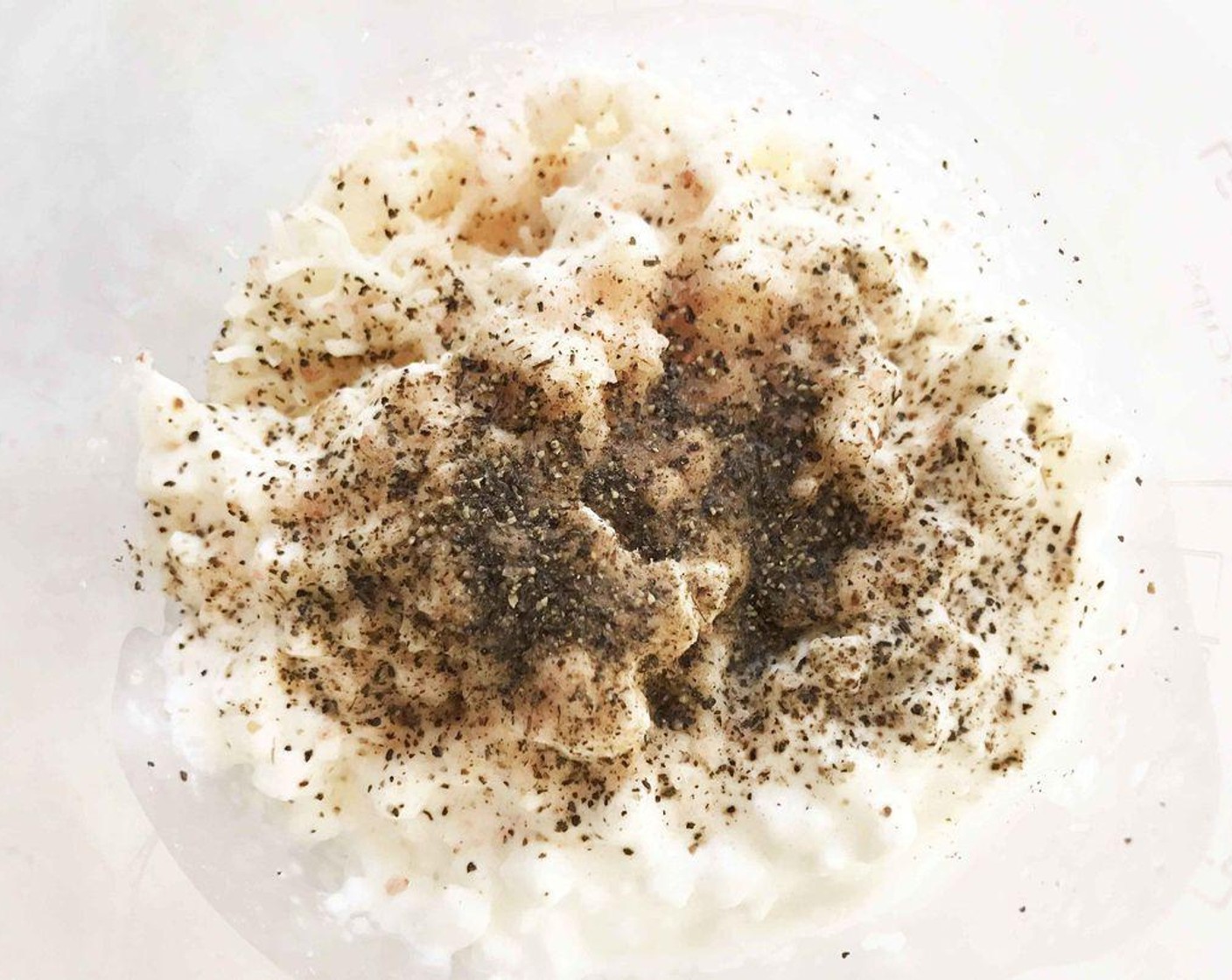 step 6 Add the Farmhouse Eggs® Large Brown Eggs (4), Parmesan, Romano & Asiago Cheese Blend (1 1/2 cups), Cottage Cheese (1/2 cup), Heavy Cream (4 Tbsp), Salt (to taste), and Ground Black Pepper (to taste) into a blender, food processor, or cup for an immersion blender.