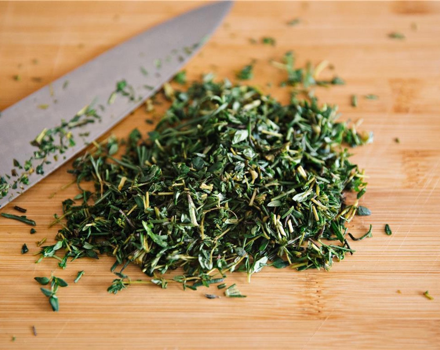 step 3 Finely chop the Fresh Rosemary (2 Tbsp) and Fresh Thyme (2 Tbsp). Add along with the bread in the mixing bowl.