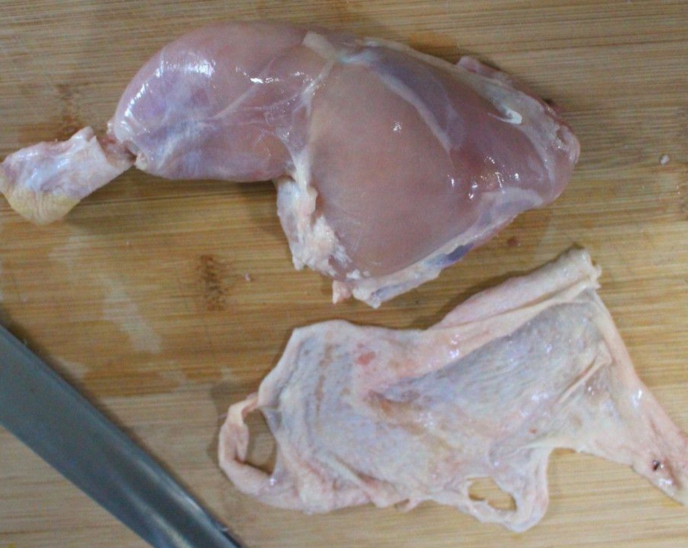step 1 Remove the skin from the Bone-In, Skin-On Chicken Legs (4).