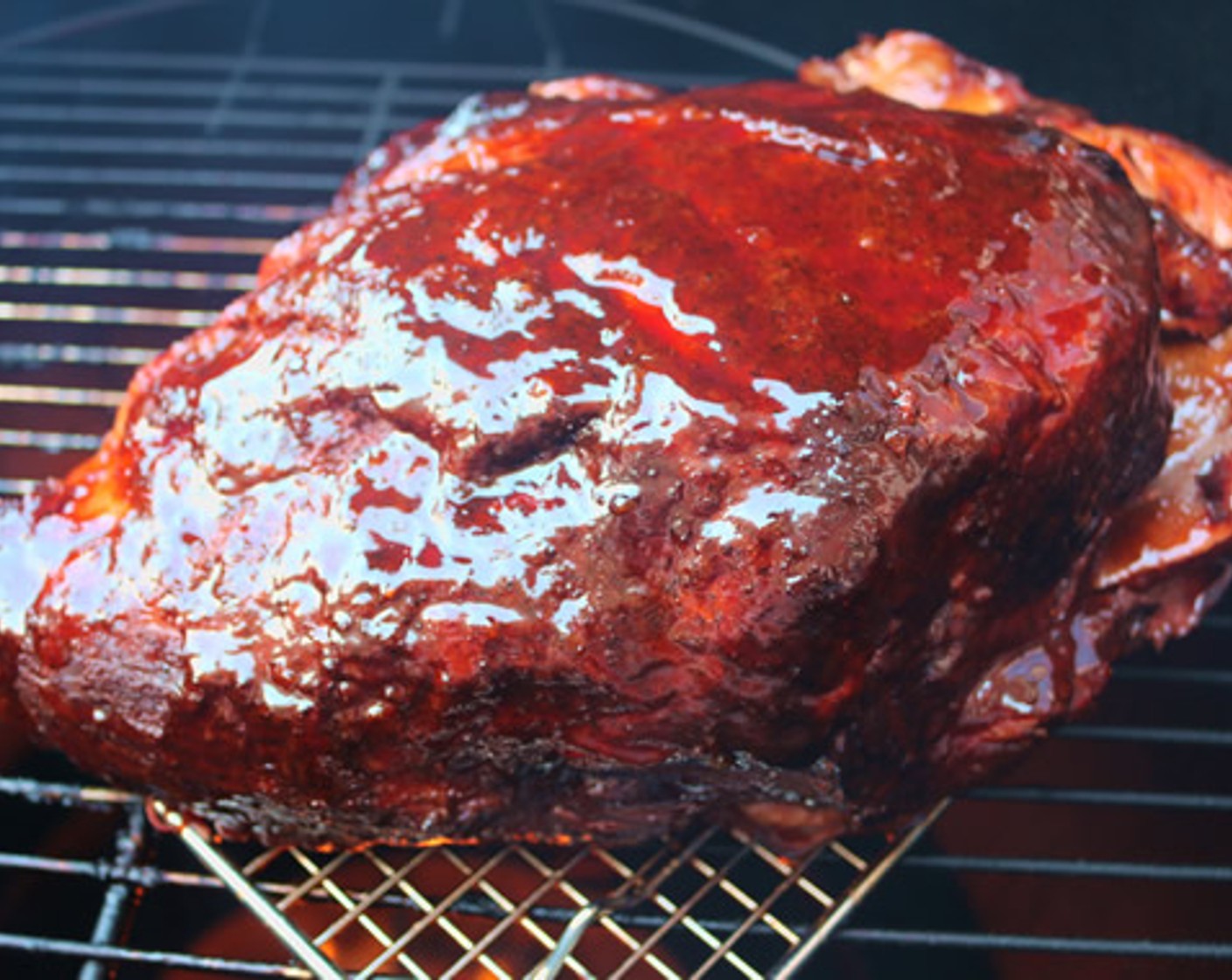 step 8 Unwrap Boston Butt and transfer to wire rack. Glaze outside of butt with Apricot BBQ Glaze and return to smoker for 15 minutes.