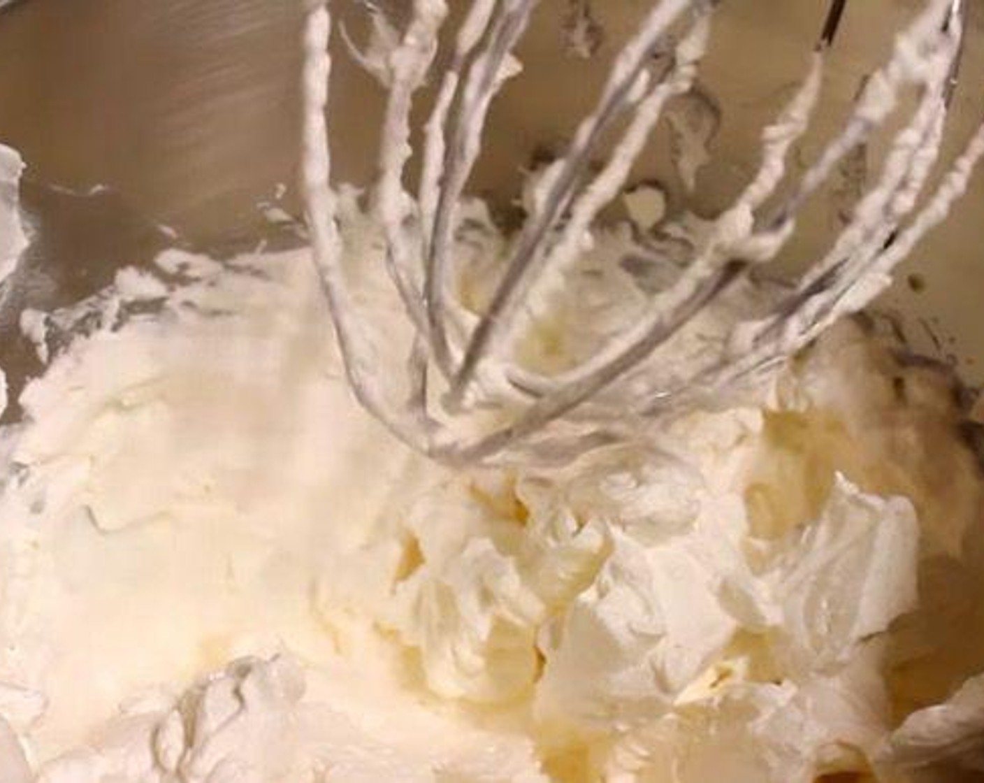 step 4 In a stand mixer or large bowl with a hand mixer, combine Heavy Cream (1 1/2 cups) and Vanilla Extract (1 tsp) and mix on medium-high speed until a stiff whipped cream is made. Be careful as to not mix too long or you'll get butter. Add to cooled egg and mascarpone mixture and fold gently to incorporate.