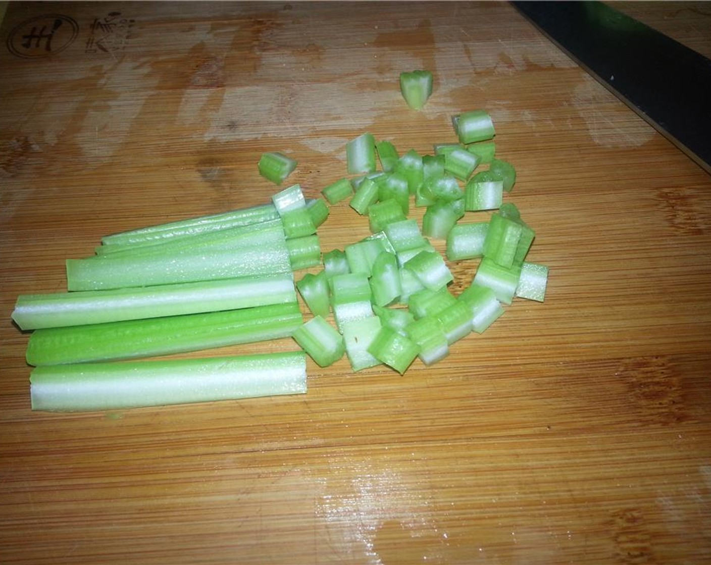 step 2 While the pork shoulder comes to temp, julienne the Yellow Onion (1), cube the Carrots (2), thinly slice the Celery (1 stalk), Garlic (2 cloves) and Serrano Chilis (2).