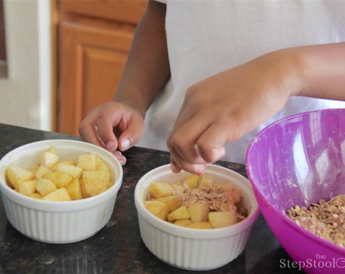 step 6 Lightly grease ramekin cups or baking dish with cooking spray. Place the filling into the ramekin cups or baking dish then sprinkle topping over filling.