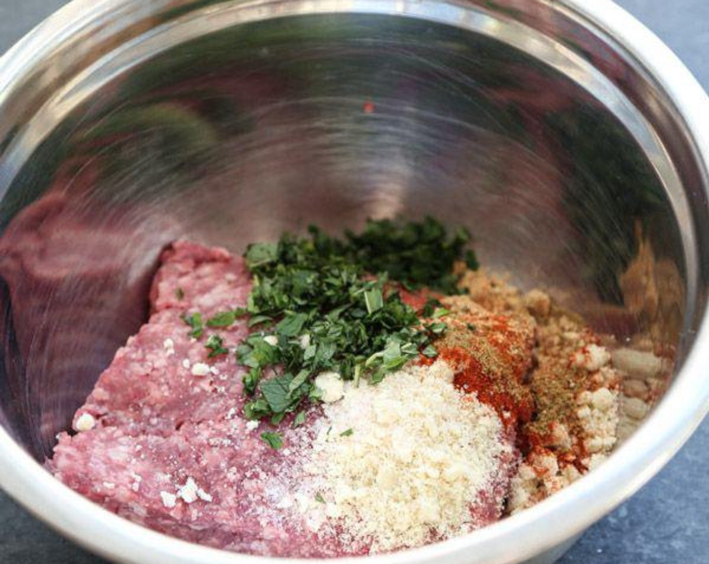 step 2 In a medium mixing bowl, combine the Ground Lamb (1 lb), Almond Meal (1/4 cup), Egg (1), Tomato Paste (1 Tbsp), Sea Salt (1 tsp), Ground Cumin (1/4 tsp), Ground Ginger (1/4 tsp), Smoked Paprika (1/4 tsp) and Cayenne Pepper (1 pinch). With clean hands, mix the lamb until well combined, making sure not to overly break apart the meat.