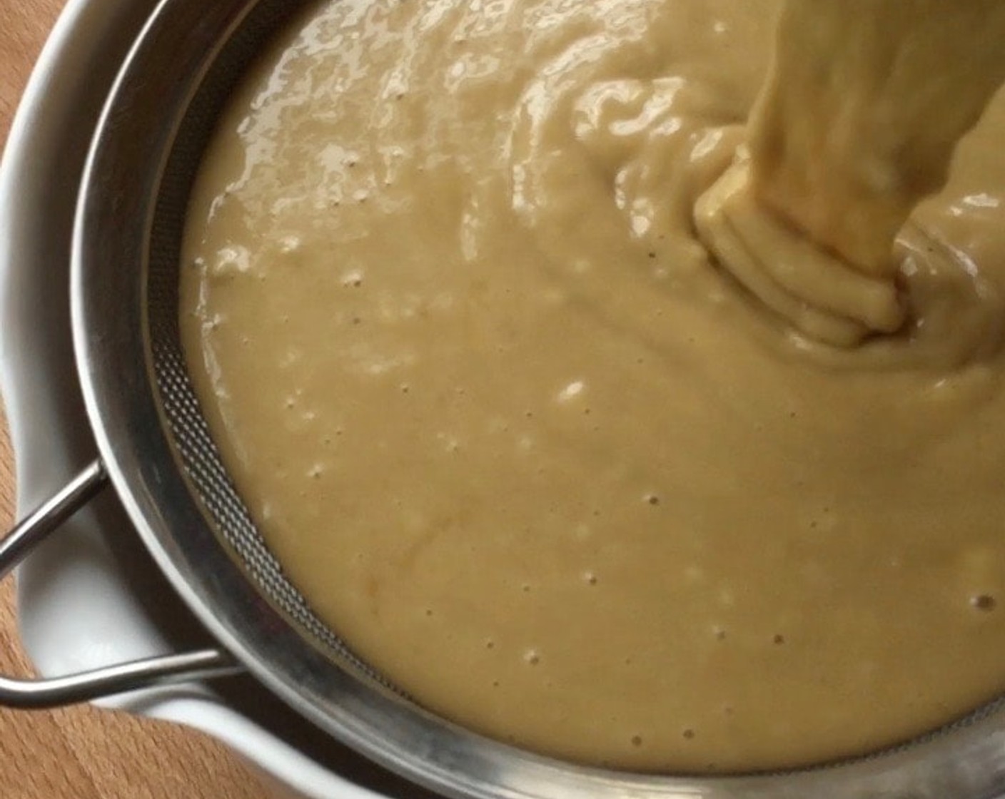 step 15 Strain batter into a large measuring cup. This makes it easier to pour into cupcake moulds.