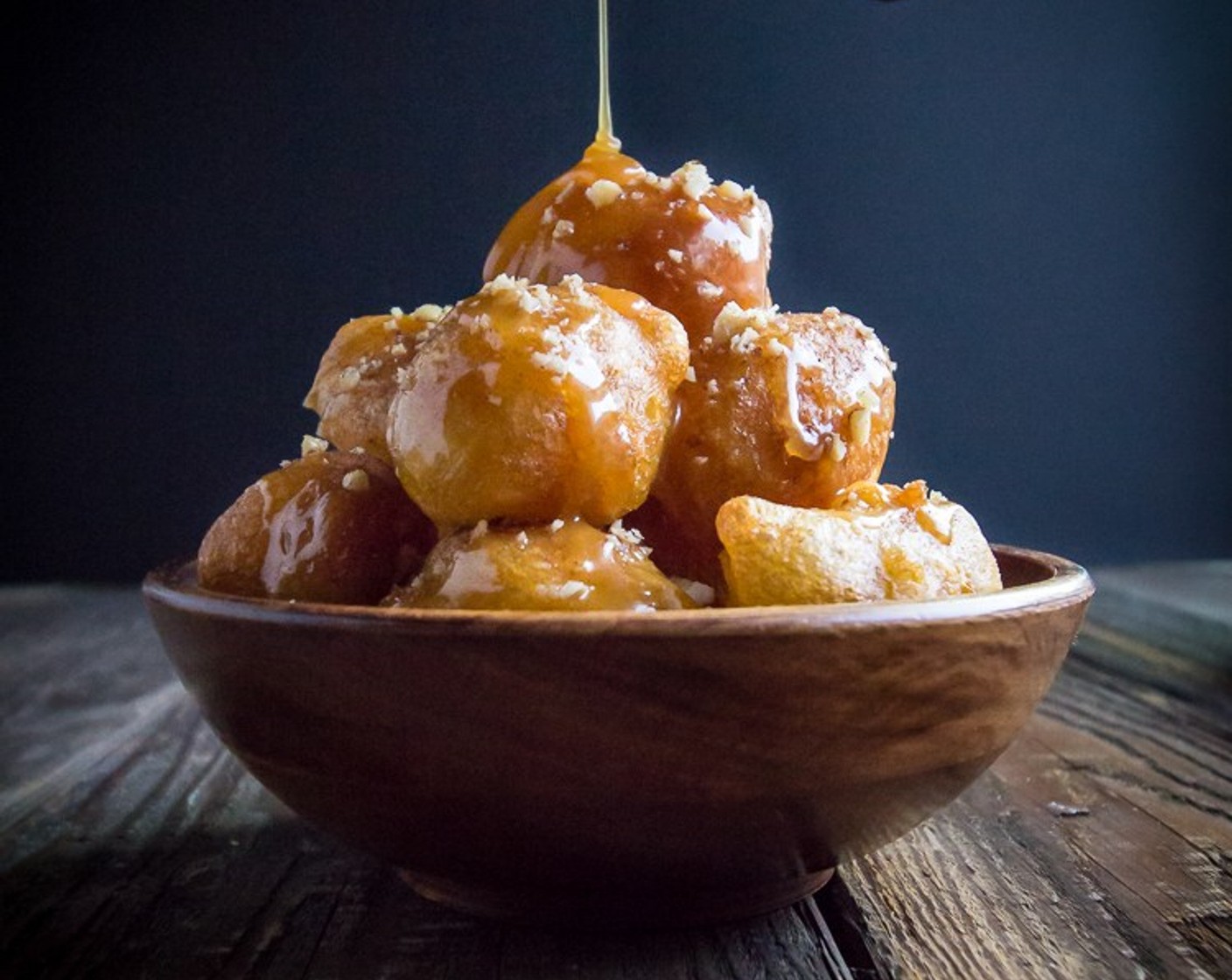 step 11 Drizzle donuts with honey caramel sauce, sprinkle with a bit of Walnut (1/4 cup) and using a small sieve, dust the donuts withPumpkin Pie Spice (1 Tbsp) and serve. Enjoy!