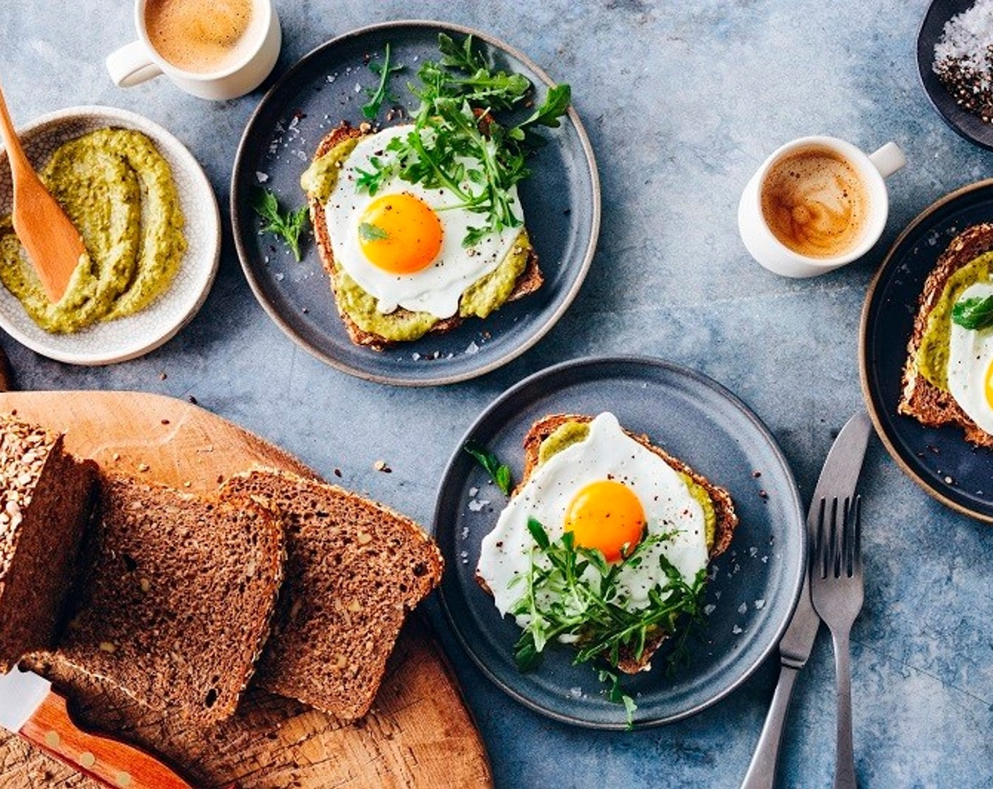 step 4 Spread Basil Pesto (4 Tbsp) on toast, add one egg to each slice and top with arugula.