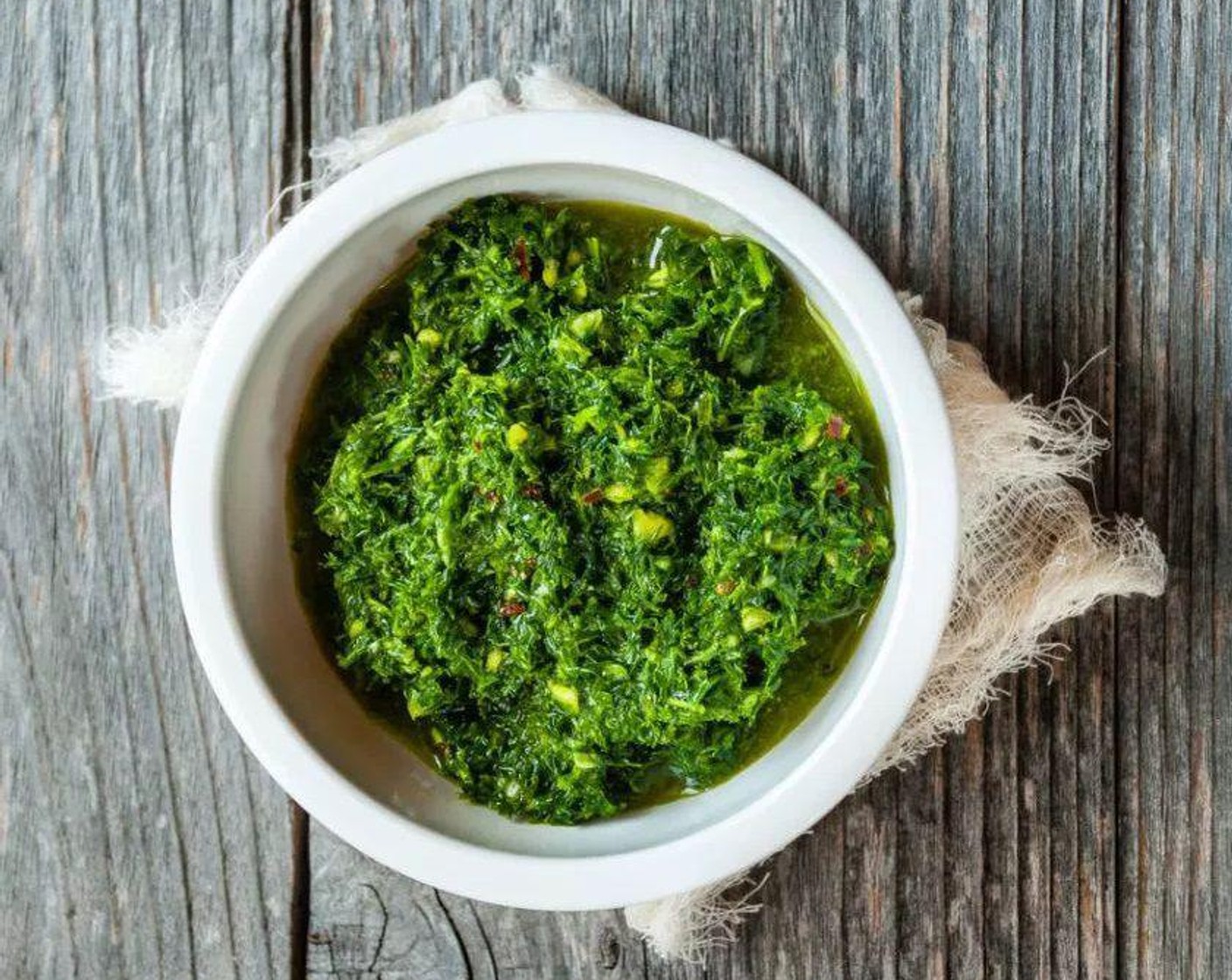 step 5 Prepare pesto. In a food processor or blender, combine Fresh Parsley (1 cup), Fennel Leaves (1/2 cup), Garlic (3 cloves), Red Wine Vinegar (1 Tbsp), and Crushed Red Pepper Flakes (1/4 tsp). Pulse until combined, and slowly add Extra-Virgin Olive Oil (1/4 cup) while the food processor is running until fully combined. Add Salt (to taste) and Ground Black Pepper (to taste).