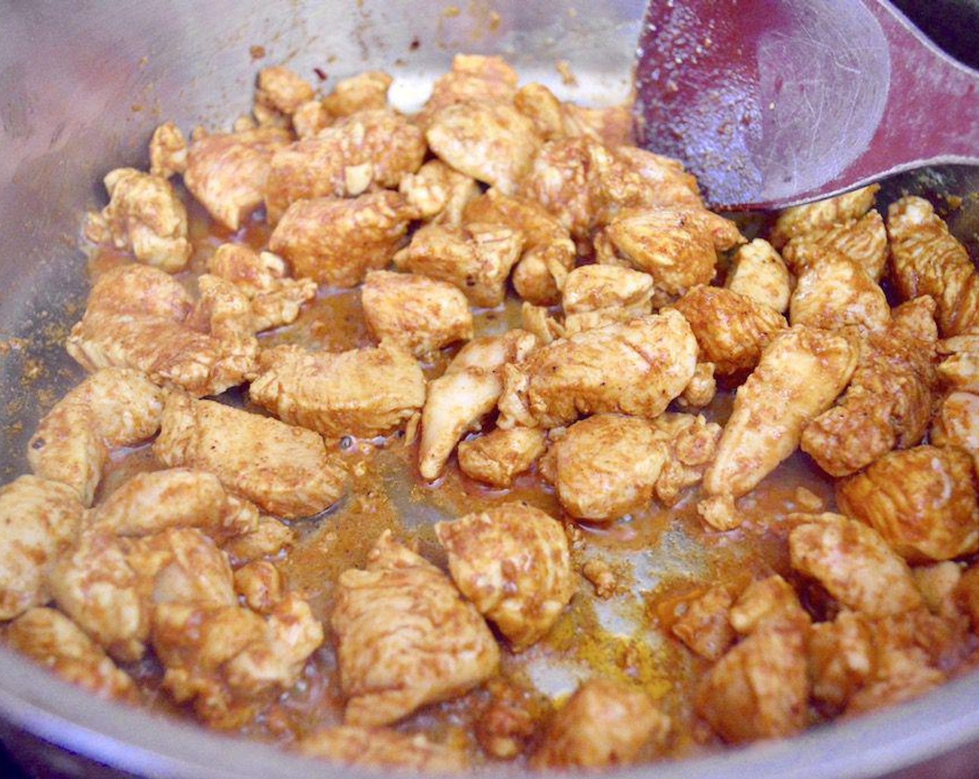 step 3 Brown the Boneless, Skinless Chicken Breast (1 lb) in the pan until it's completely cooked through. While it cooks, season it with Ras el Hanout (1/2 tsp), Ground Turmeric (1/2 tsp), Paprika (1/2 tsp), Salt (1 pinch) and Ground Black Pepper (1 pinch). Once it is cooked and seasoned, transfer it to a plate.