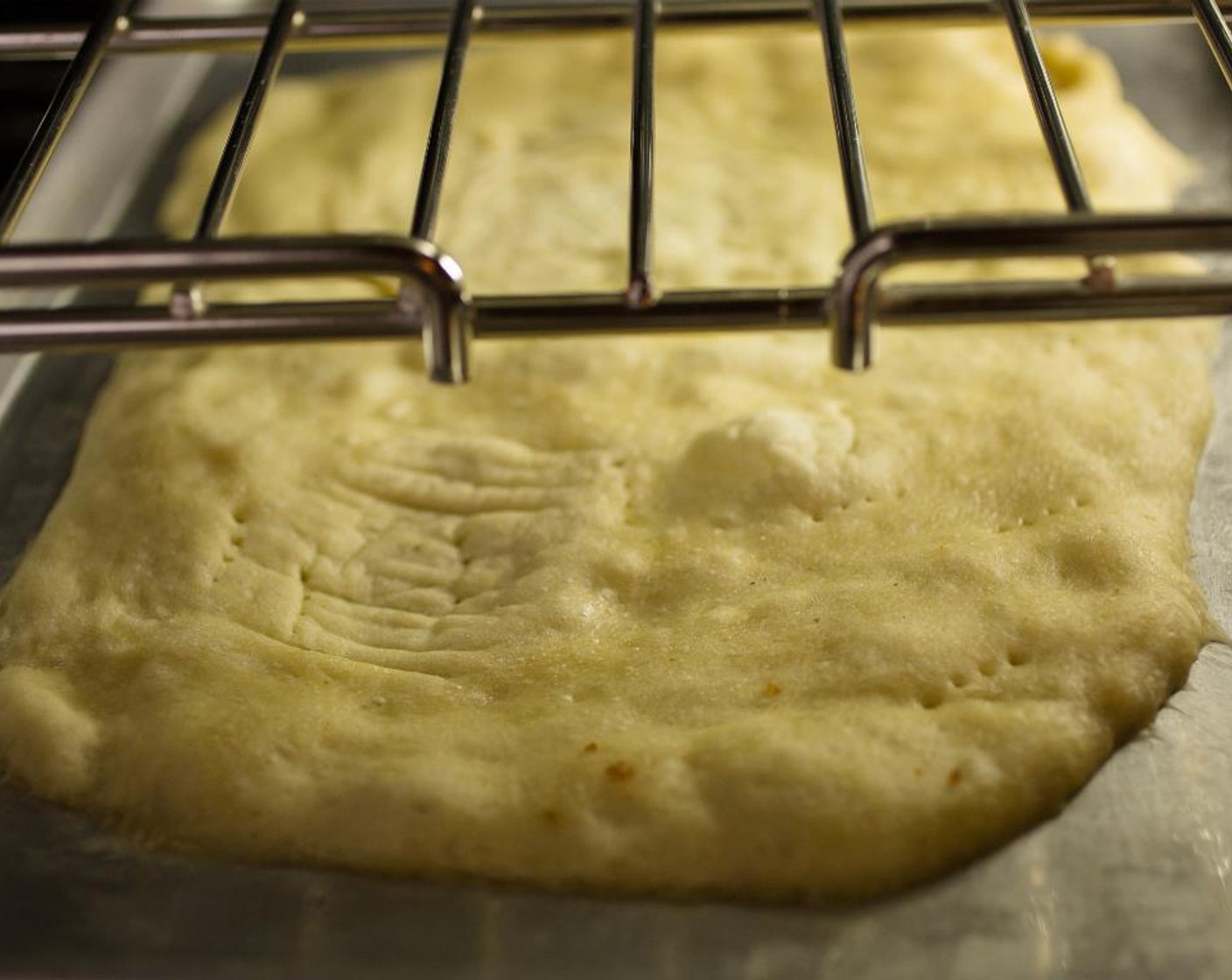 step 6 Place the dough in the oven and par-bake for 5 minutes. Set timer!