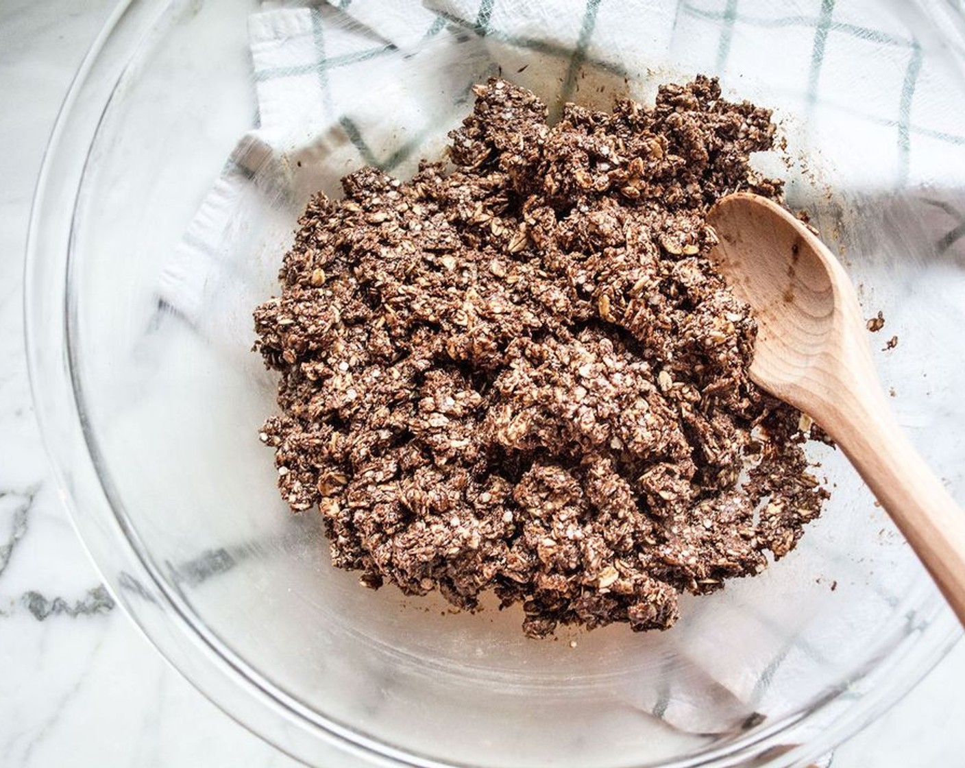 step 2 Remove from heat and stir in Vanilla Extract (1/2 Tbsp), Toasted Quinoa Flakes (2 cups), Old Fashioned Rolled Oats (2 cups), Dark Chocolate Chips (3/4 cup) and Powdered Peanut Butter (1/4 cup). Stir until toasted quinoa flakes and rolled oats are are fully coated.