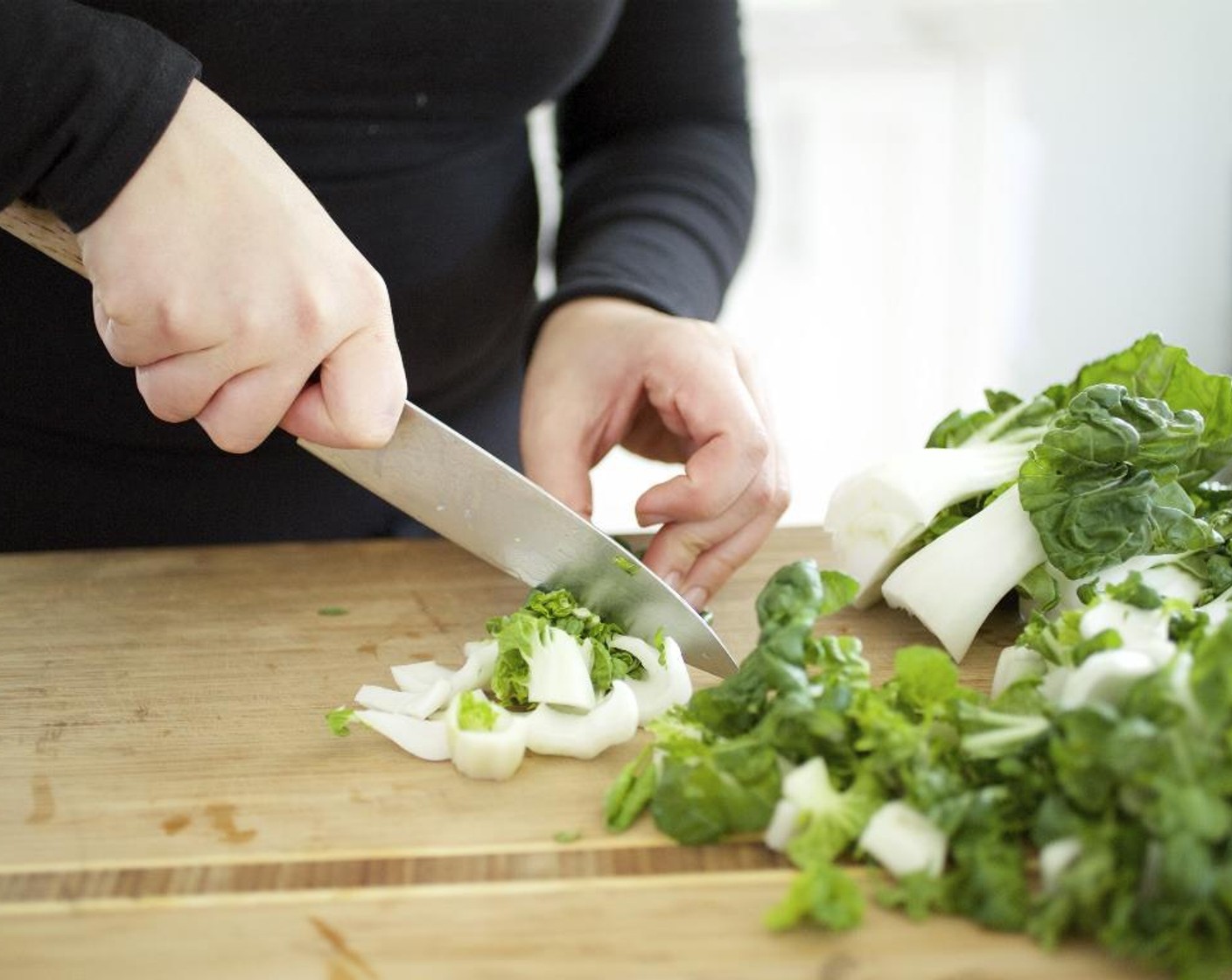 step 1 Cut off the bottom end of the Choy Sum (12 oz) and discard. Chop into 1/2-inch pieces and set aside.