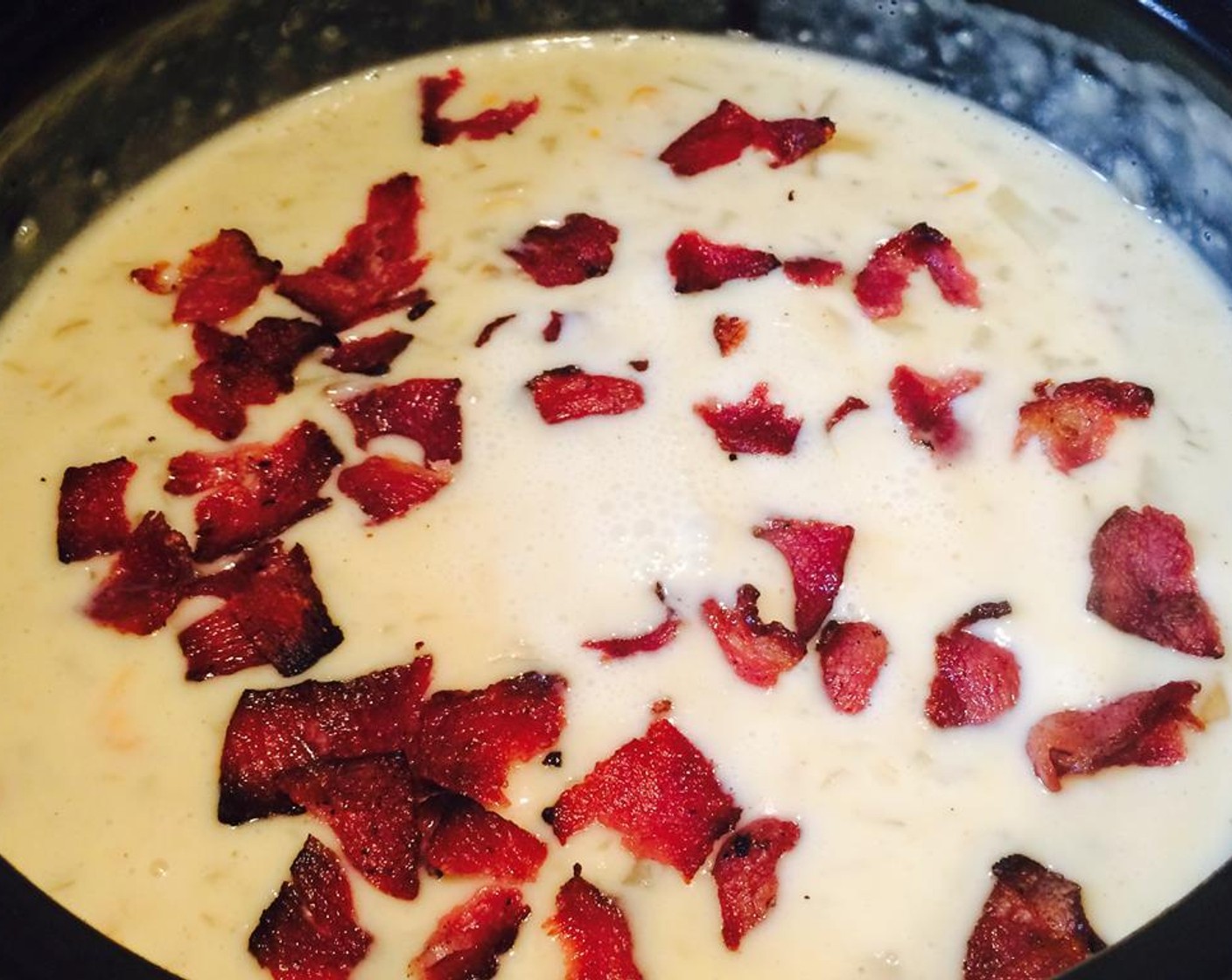 step 12 Crumble the crispy bacon and add it to the pot. Season with Ground Black Pepper (to taste).