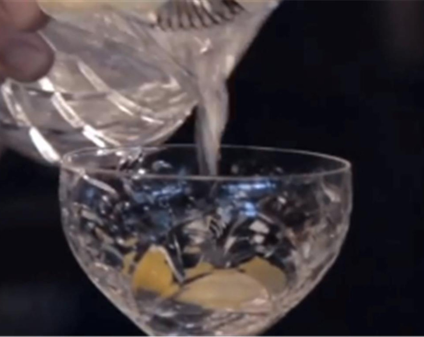 step 3 Strain cocktail into the glass then remove the lemon zest slice. Enjoy!