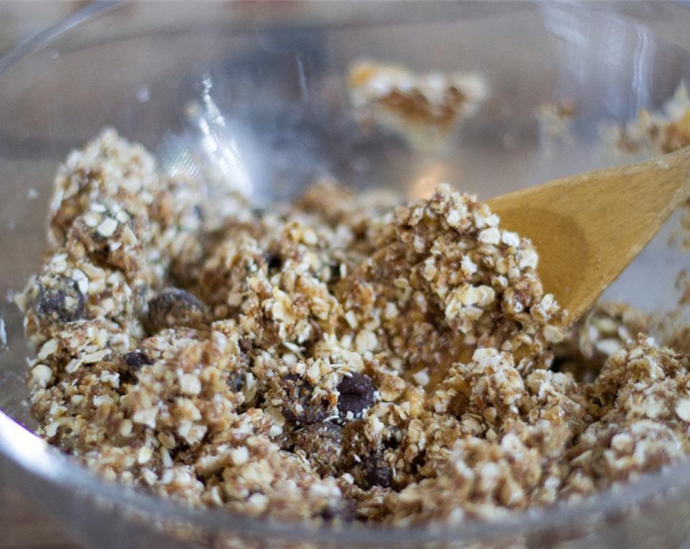 step 2 Mix Old Fashioned Rolled Oats (1 cup), Creamy Natural Peanut Butter (1/2 cup), Flaxseed Meal (1/2 cup), Raw Honey (1/3 cup), Dark Chocolate Chips (1/2 cup), and the chopped almonds together until dry ingredients are coated completely.