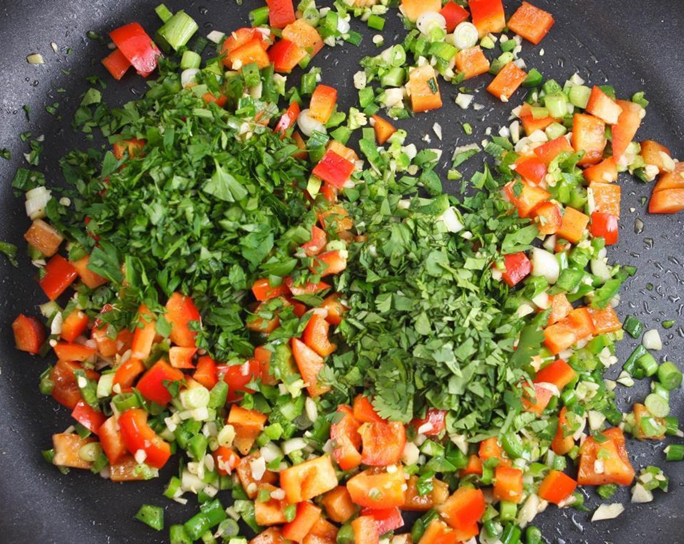 step 2 Add Italian Flat-Leaf Parsley (1/4 cup) and Fresh Cilantro (1/4 cup). Cook for an additional 2 minutes.